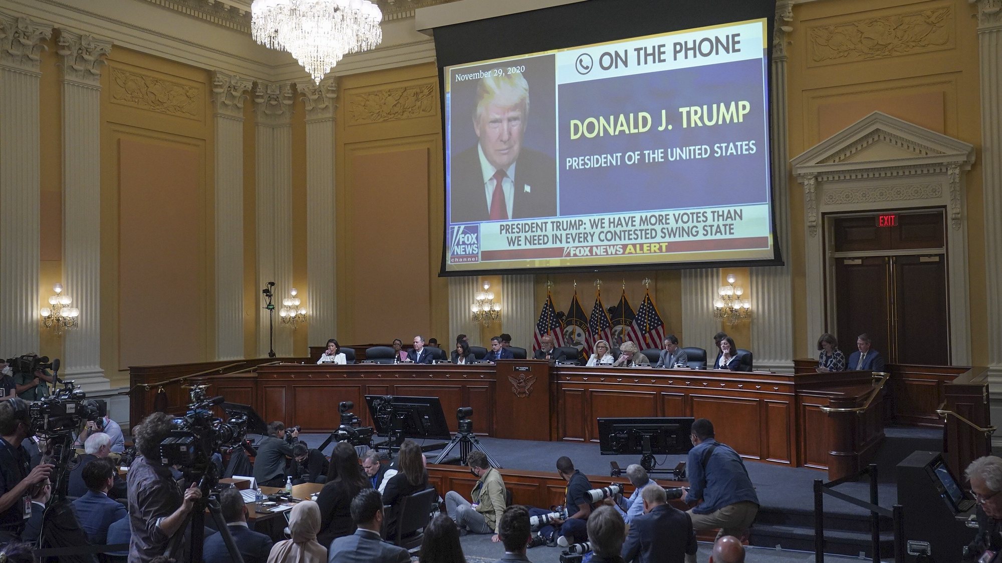 epa10030613 An image of former US president Donald Trump phoning into a Fox News interview is shown on a screen, as the House Jan. 6 select committee holds a hearing on Capitol Hill in Washington, DC, USA, 23 June 2022.  EPA/Demetrius Freeman / POOL