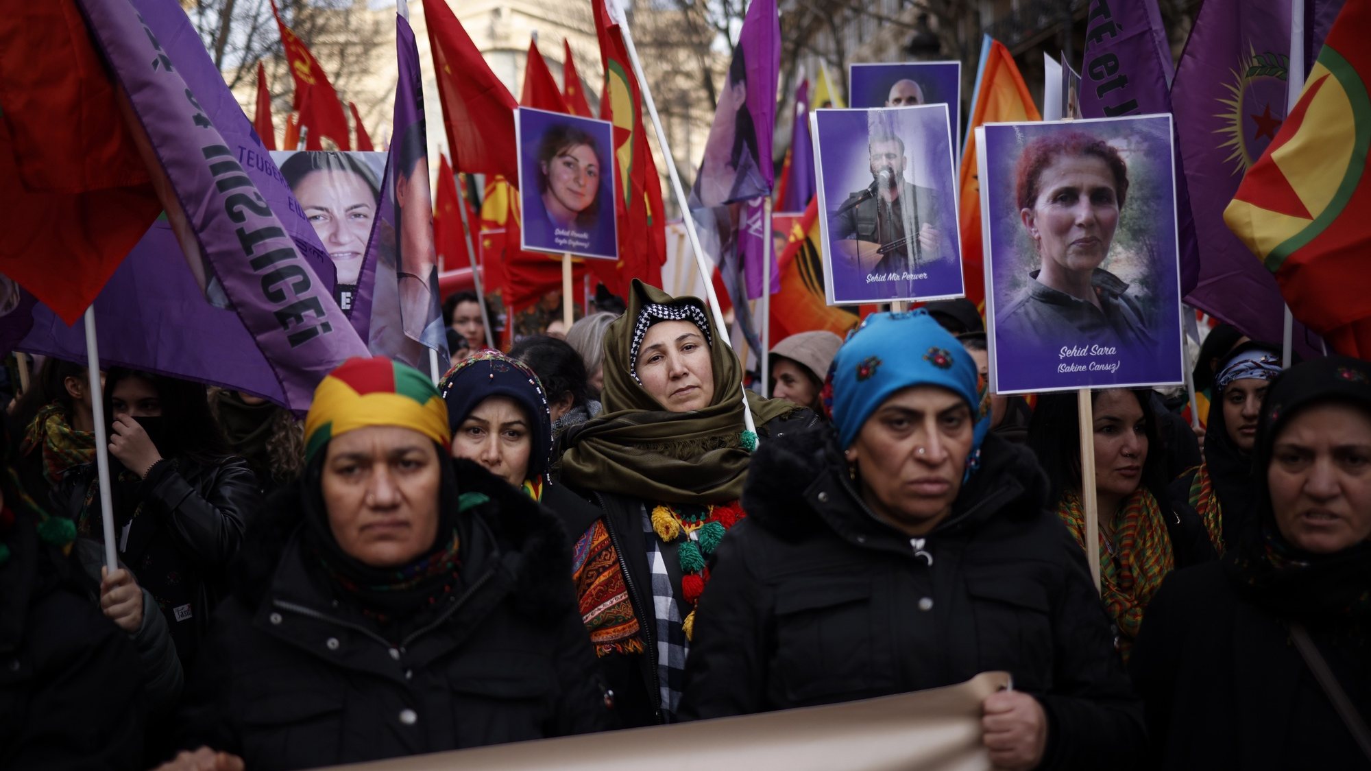 epa10394170 Members of the Kurdish community take part in a demonstration marking the 10th anniversary of the killing of three Kurdistan Workers Party (PKK) members in Paris, France, 07 January 2023. Three Kurdish women, including the founding member of the PKK, were shot dead at a community center in Paris on 10 January 2013. The commemoration comes a few days after a gunman opened fire outside a Kurdish cultural center in central Paris on 23 December 2022, killing three people.  EPA/YOAN VALAT