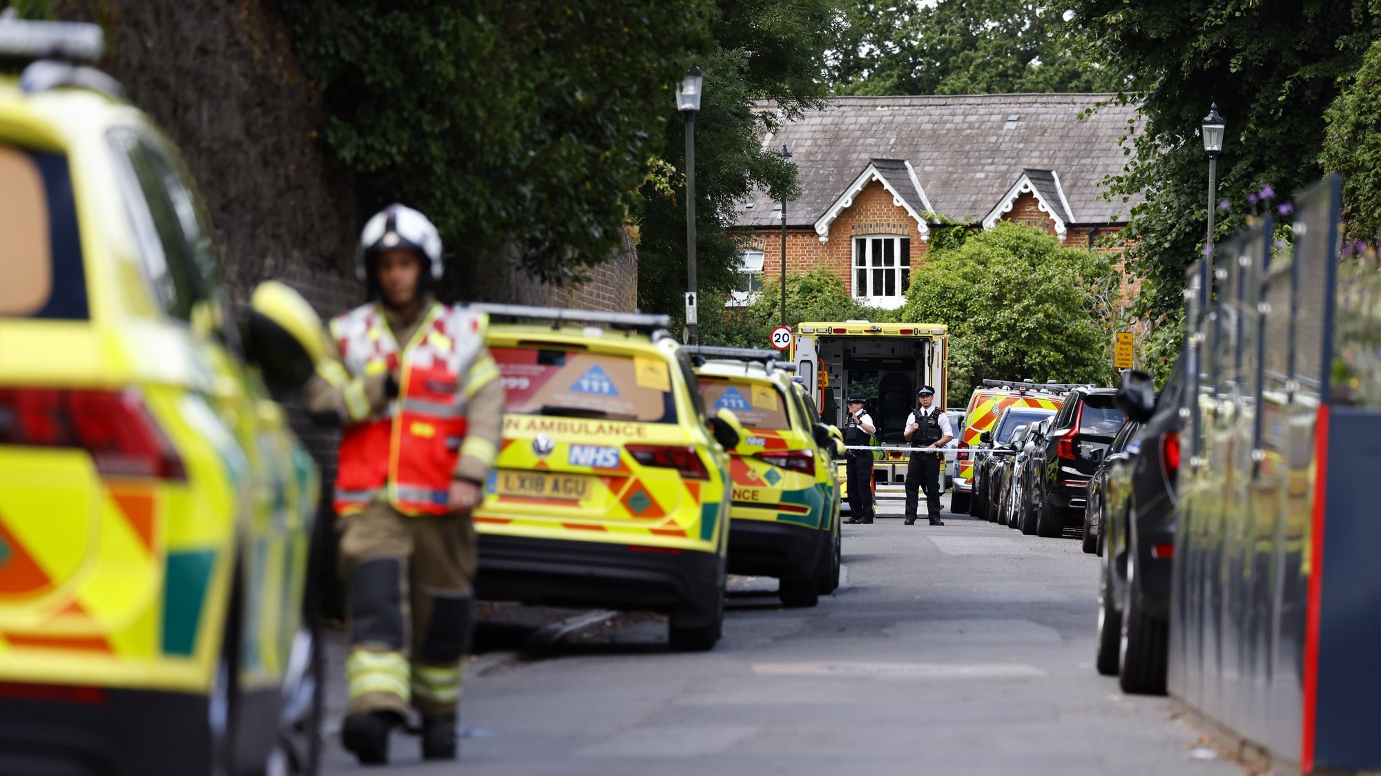 epa10729471 Emergency services on the site where a car crashed into a primary school in Wimbledon, London, Britain, 06 July 2023. Seven children and two adults have been injured according to Metropolitan Police. The incident is not being investigated as terror related.  EPA/TOLGA AKMEN