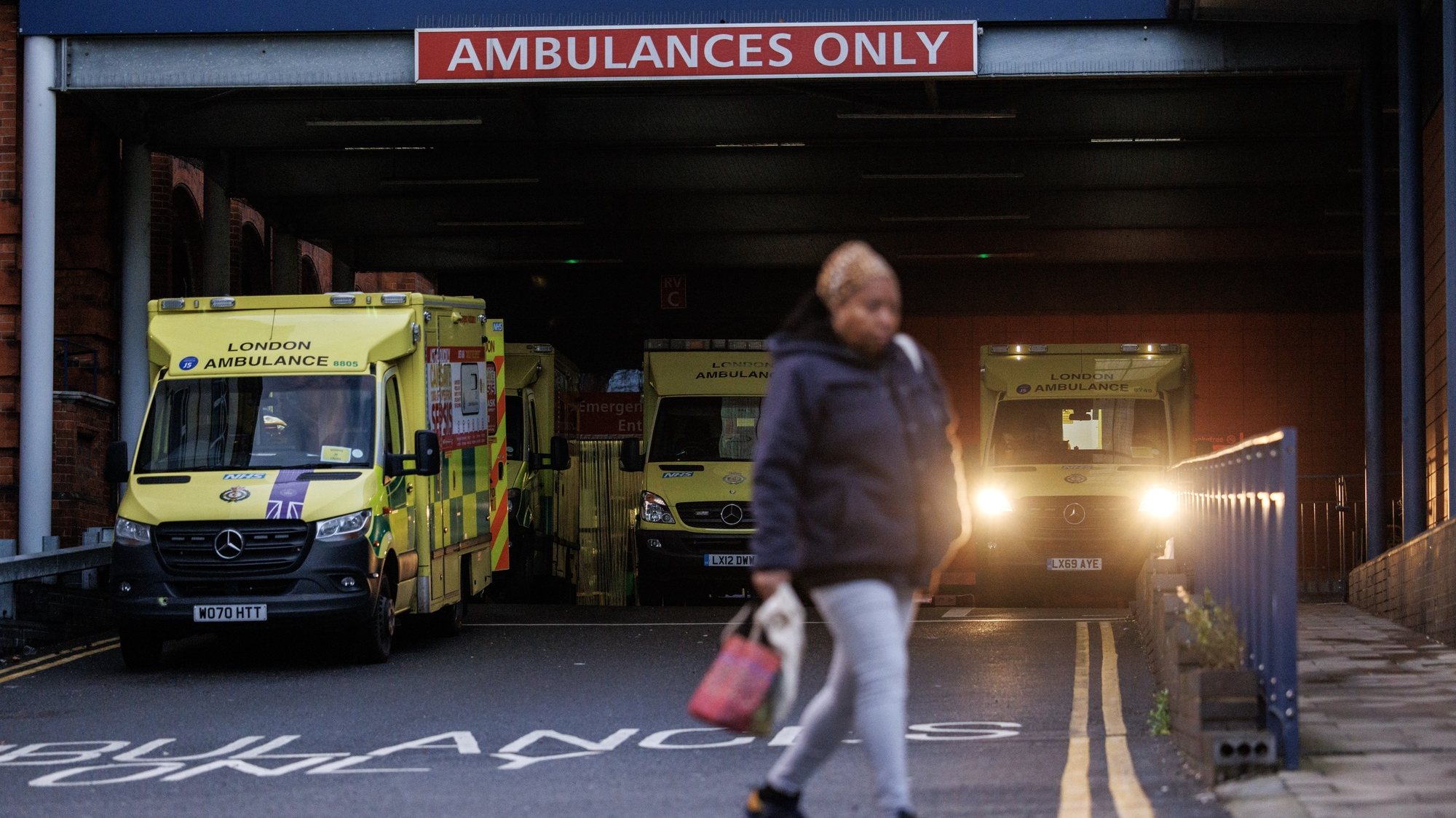 epaselect epa11053833 Ambulances wait at the Emergency Department (A&amp;E) of Whipps Cross Hospital in London, Britain, 02 January 2024. A six-day strike over pay by junior doctors from the British Medical Association (BMA) is set to take place from 03 to 9 January 2024. The longest continuous stretch of industrial action in the history of the National Health Service (NHS) will come at a time of rising rates of flu, Covid and other winter infections, making it one of the most difficult starts to the year for the service since it was founded in 1948.  EPA/TOLGA AKMEN