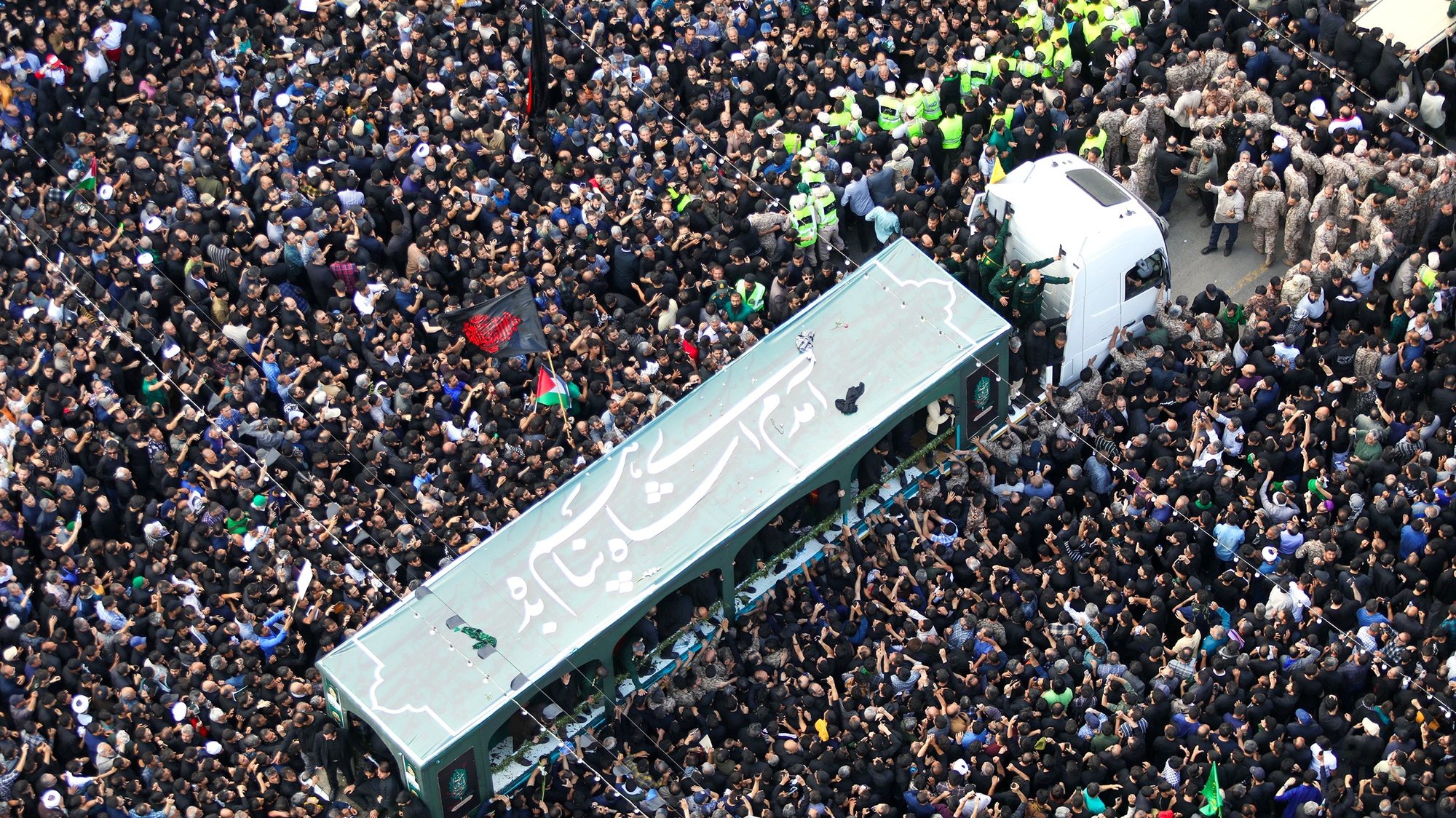 epa11363565 A handout photo made available by the Iranian presidency shows Iranians attending funeral of late president Ebrahim Raisi, in Mashhad, Iran, 23 May 2024. Iranian president Raisi and seven others, among them foreign minister Amir-Abdollahian, were killed in a helicopter crash on 19 May 2024, after an official visit in Iran&#039;s northwest near the border with Azerbaijan, the Iranian government confirmed. Iran&#039;s Supreme Leader Ayatollah Ali Khamenei on 20 May announced a five-day public mourning following Raisi&#039;s death.  EPA/IRANIAN PRESIDENCY / HANDOUT   HANDOUT EDITORIAL USE ONLY/NO SALES HANDOUT EDITORIAL USE ONLY/NO SALES