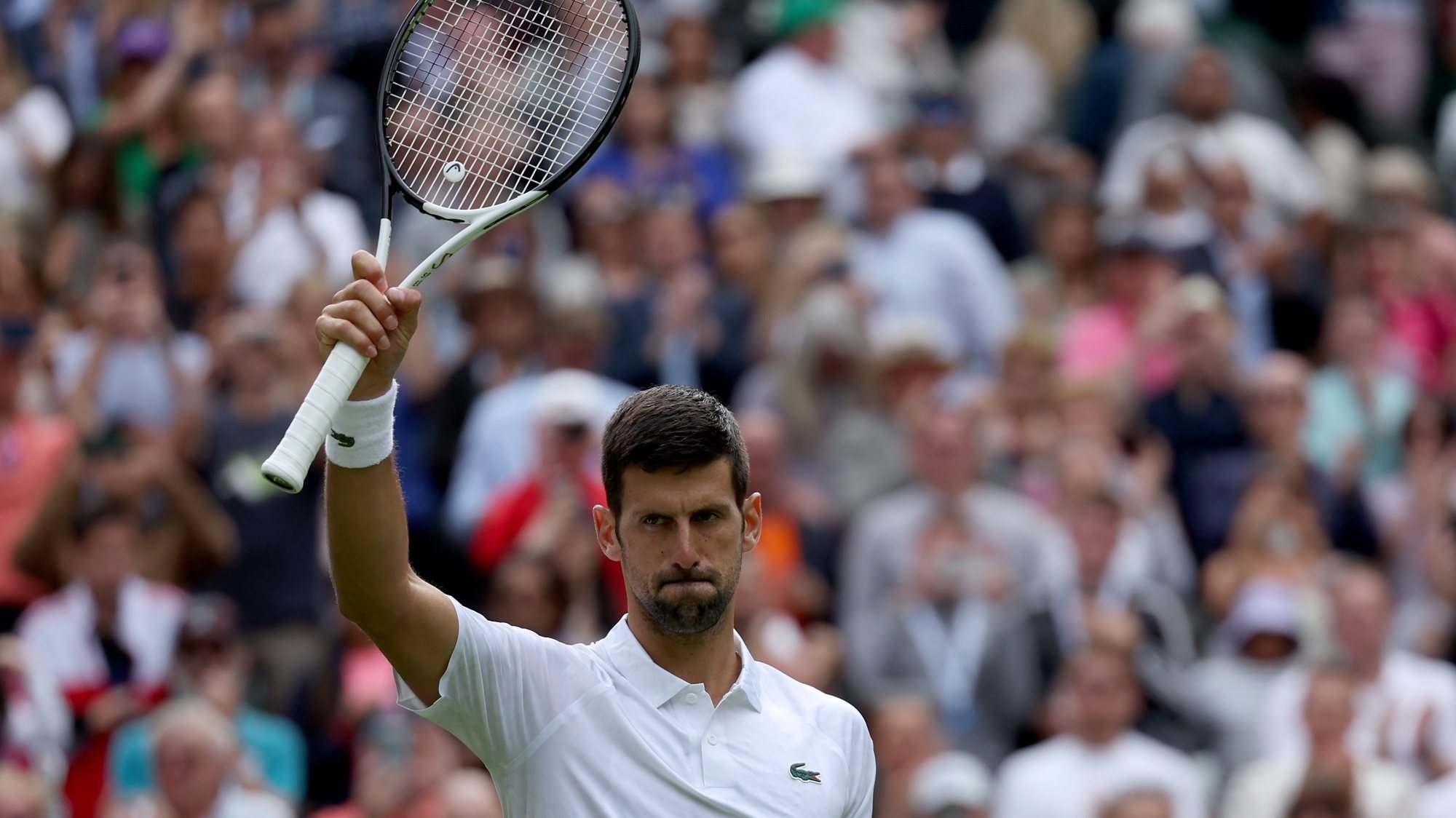 epa10724402 Novak Djokovic of Serbia reacts after winning against Pedro Cachin of Argentina in their 1st round match at the Wimbledon Championships, Wimbledon, Britain, 03 July 2023.  EPA/NEIL HALL   EDITORIAL USE ONLY  EDITORIAL USE ONLY