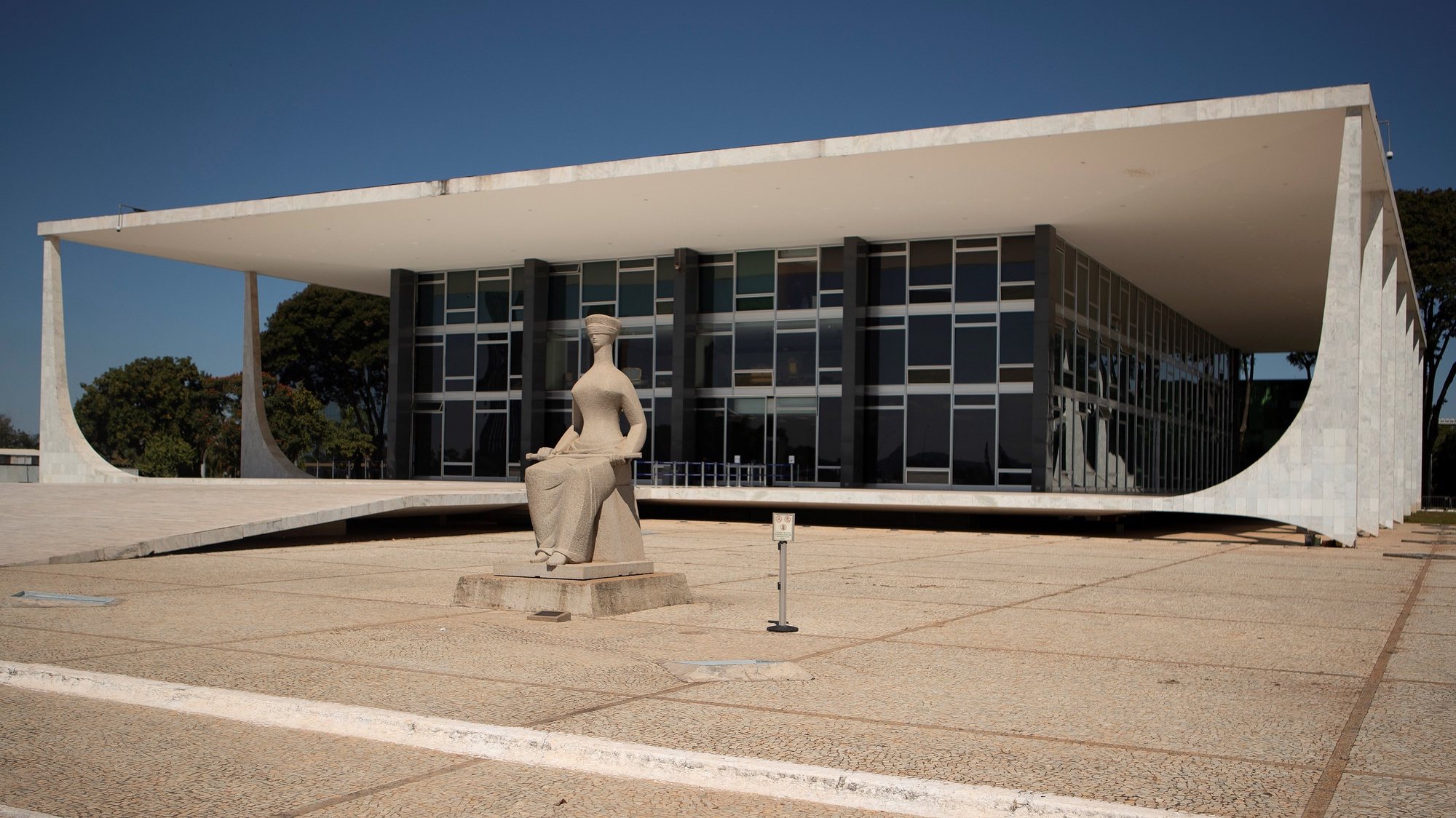 epa09258234 Exterior view of the Supreme Court of Brazil, in Brasilia, Brazil, 09 June 2021. The plenary session of the Supreme Court of Brazil on 10 June will judge two appeals that ask for the suspension of the Copa America, a regional soccer championship that will have to bring together ten South American teams in the country as of 13 June. The President of the Federal Supreme Court (STF), Minister Luiz Fux, accepted the request of Minister Carmen Lucia, who requested that an extra session be held in the Court to judge the completion of the Copa America in Brazil.  EPA/Joedson Alves