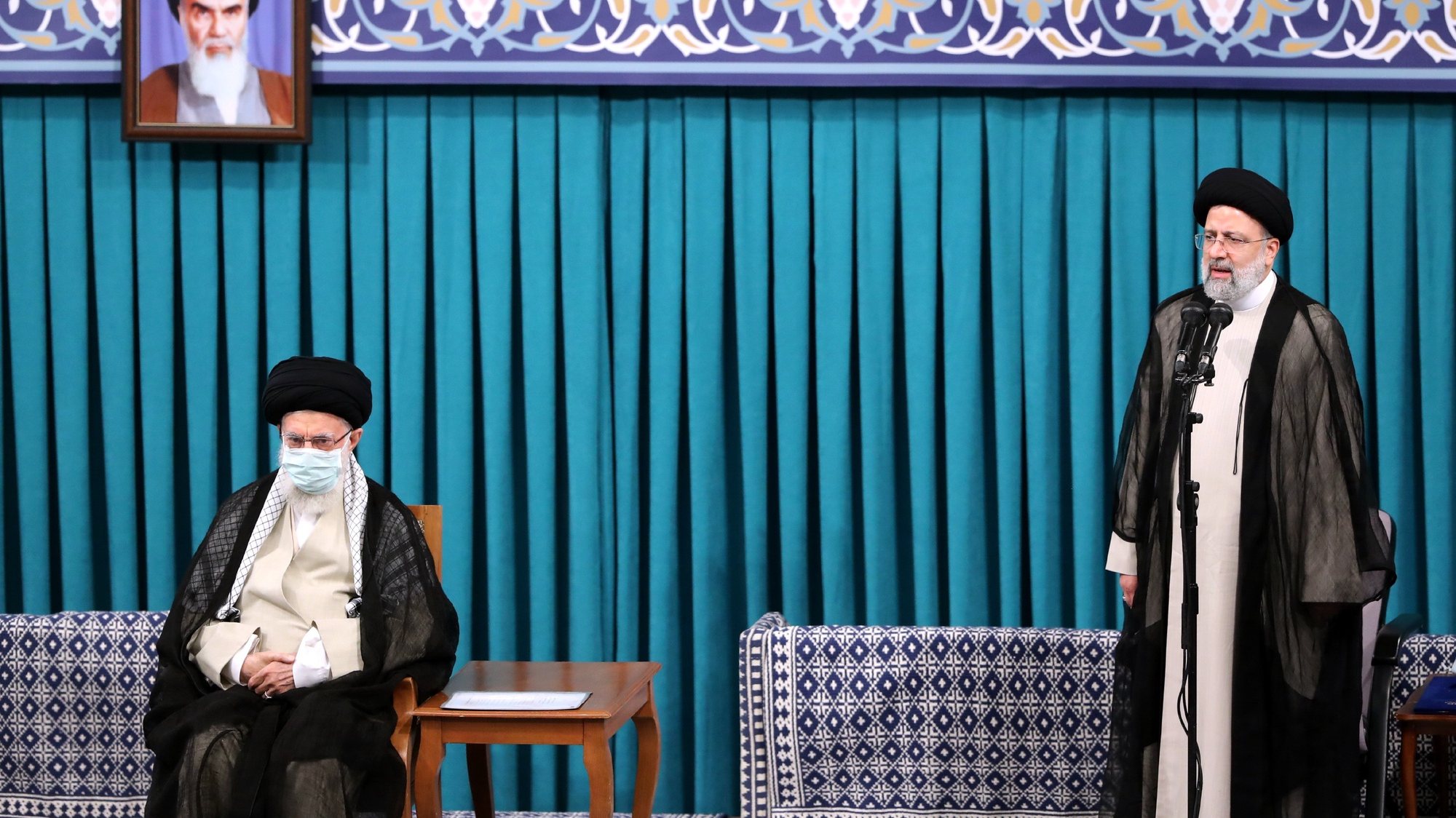 epa09389953 A handout picture made available by Iran&#039;s Supreme Leader Office shows Iranian supreme leader Ayatollah Ali khamenei (L) listens to new Iranian president Ebrahim Raisi (R), in Tehran, Iran, 03 August 2021. Iranian presidents are first approved by the supreme leader, who according to constitution is the actual head of state, and then take the oath before parliament. Ebrahim Raisi has been inaugurated as the new president of the Islamic Republic of Iran on 03 August 2021, as the country is facing an economic crisis along with the coronavirus disease (COVID-19) pandemic.  EPA/IRAN&#039;S SUPREME LEADER OFFICE HANDOUT  HANDOUT EDITORIAL USE ONLY/NO SALES