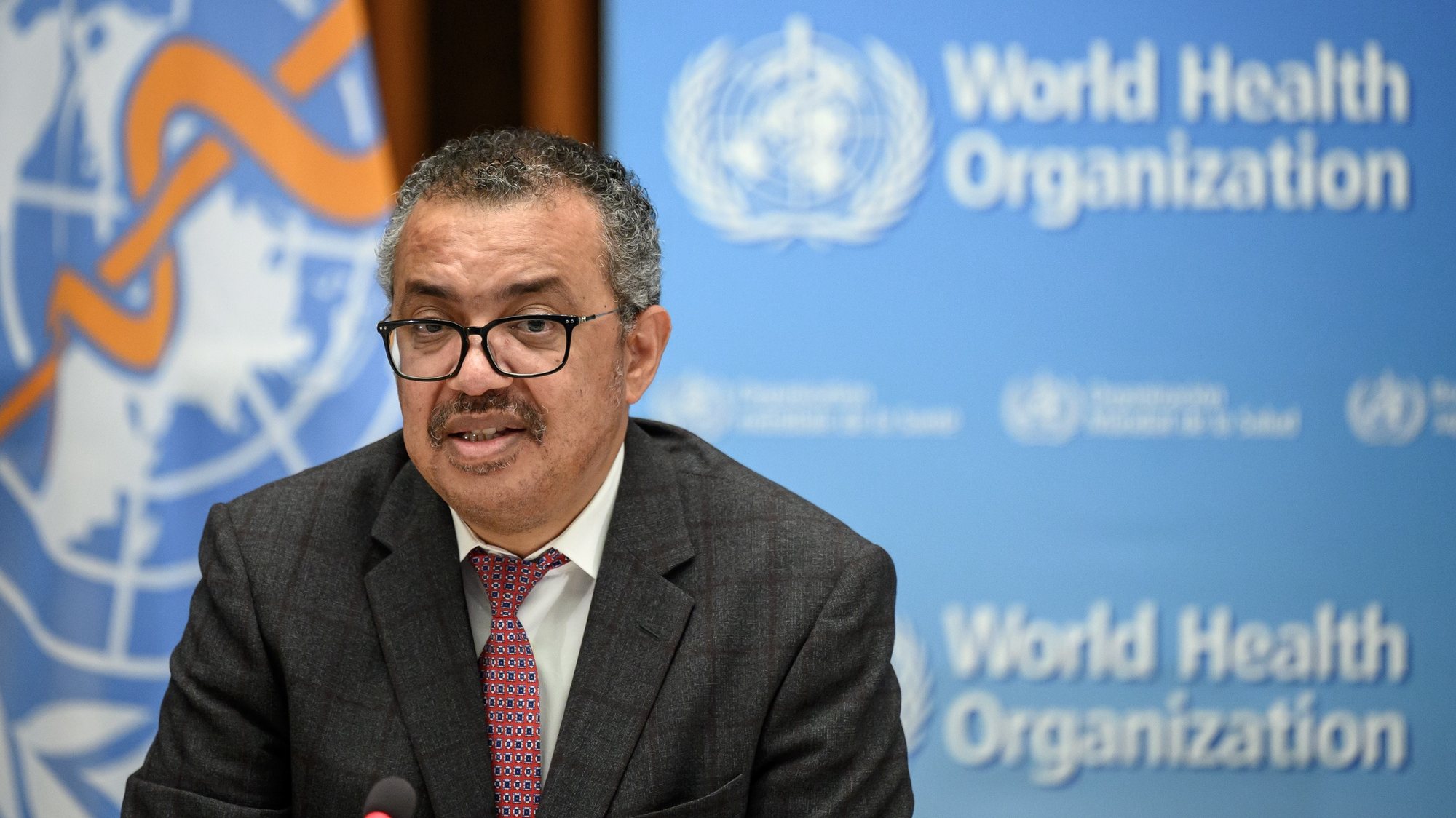 epa09529945 World Health Organization (WHO) Director-General Tedros Adhanom Ghebreyesus delivers a speech during the launch of a multiyear partnership with Qatar on making the FIFA Football World Cup 2022 and mega sporting events healthy and safe, at the WHO headquarters in Geneva, Switzerland,  18 October 2021.  EPA/FABRICE COFFRINI / POOL