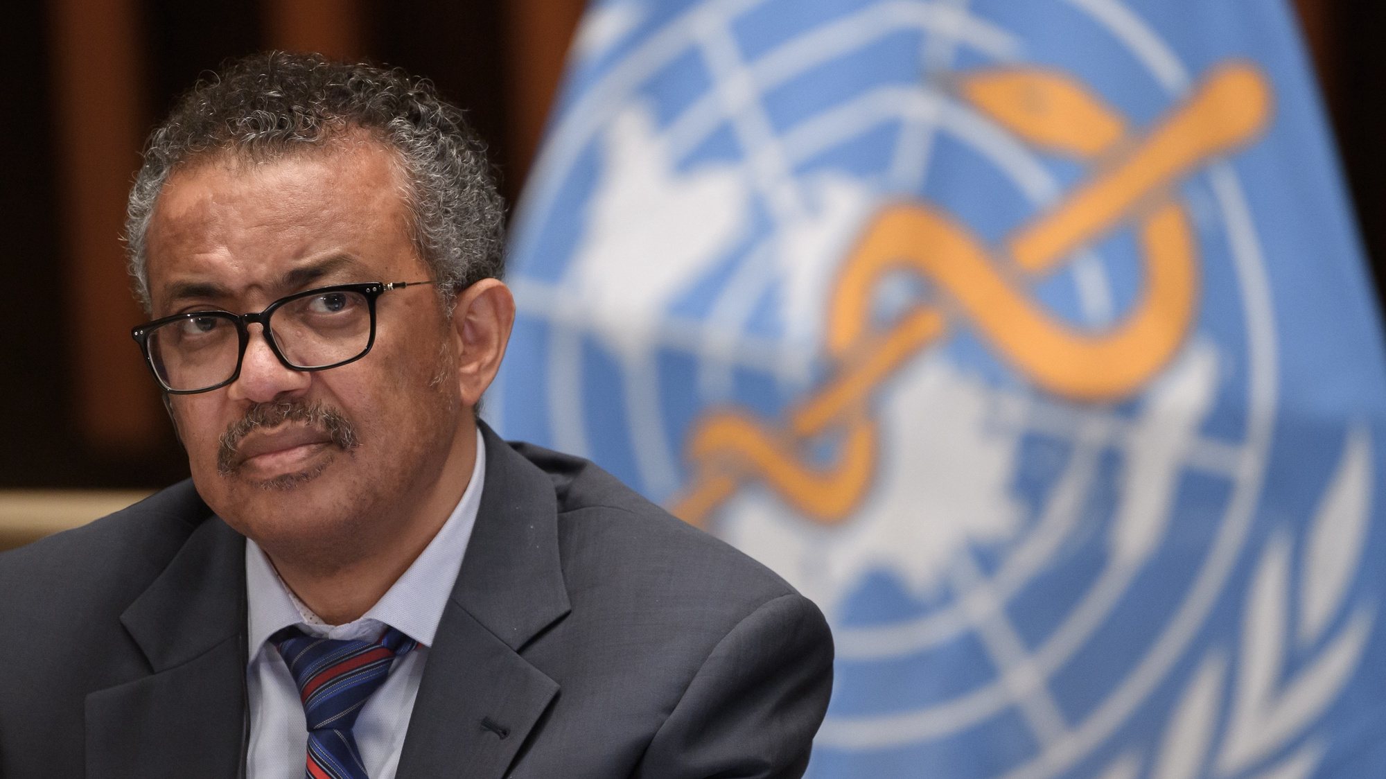 epa08525392 World Health Organization (WHO) Director-General Tedros Adhanom Ghebreyesus attends a press conference organized by the Geneva Association of United Nations Correspondents (ACANU) amid the COVID-19 pandemic, caused by the novel coronavirus, at the WHO headquarters in Geneva, Switzerland, 03 July 2020.  EPA/FABRICE COFFRINI