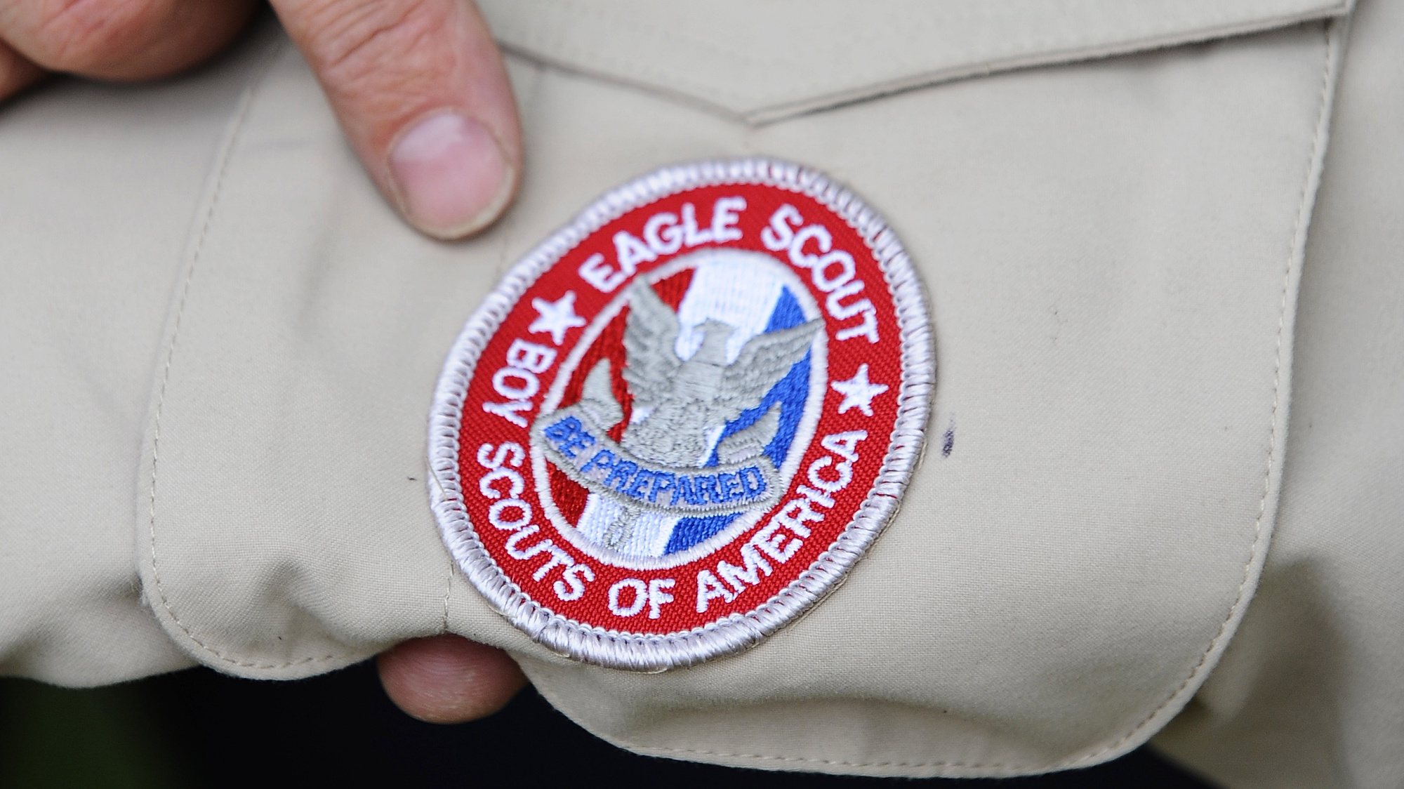 epa08225658 (FILE) - A badge of the Boy Scouts of America is photographed in Grapevine, Texas, USA, 23 May 2013 (reissued 18 February 2020). According to media reports, the Boy Scouts of America organisation has filed for bankruptcy in order to build a fund for victims of alleged sexual abuse within the organisation.  EPA/RALPH LAUER