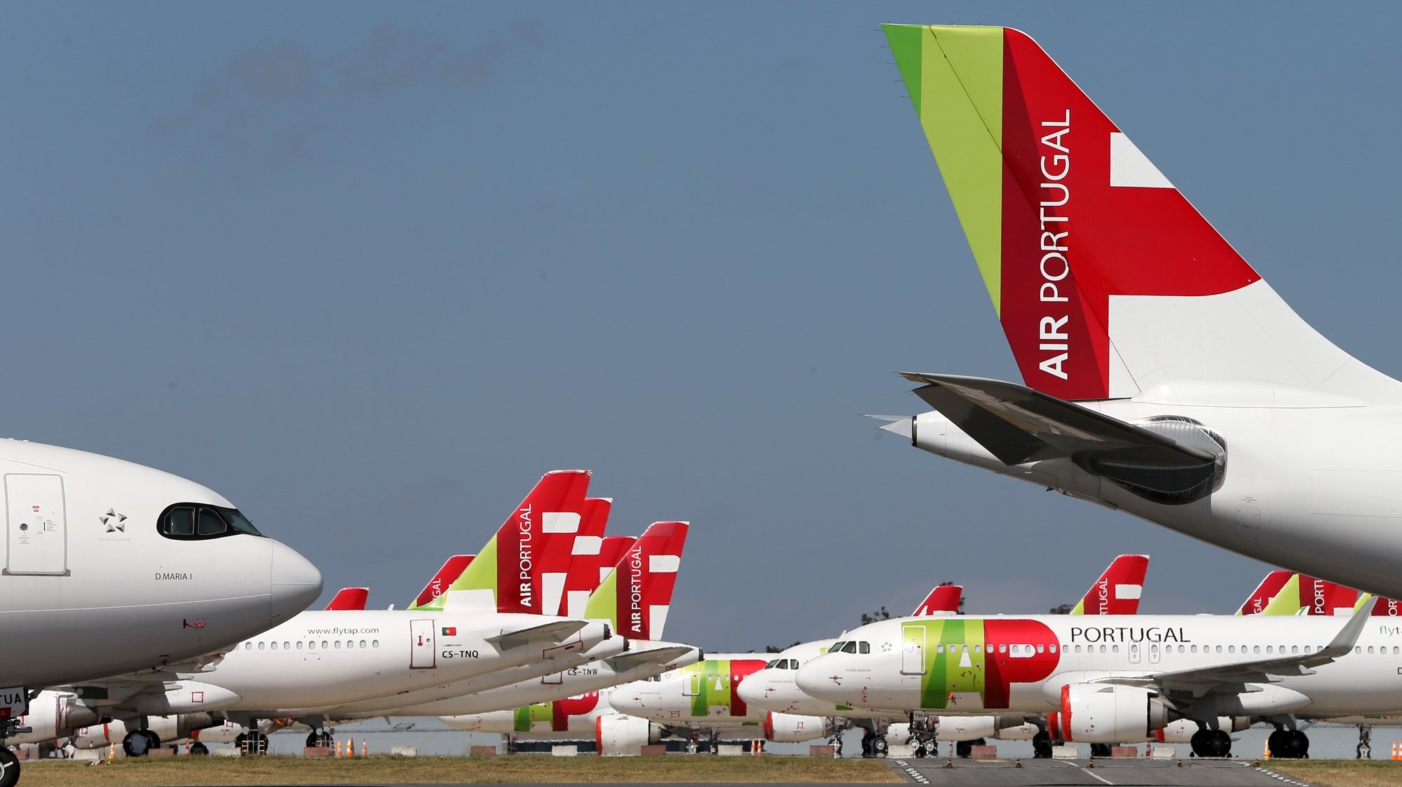 epa08524023 A TAP Air Portugal aircraft grounded at Humberto Delgado airport closed for passenger traffic as part of the exceptional traffic measures to combat the epidemiological situation of Covid-19, in Lisbon, Portugal, 09 April 2020 (reissued 02 July 2020). The granting of state support to TAP has been under discussion since the airline&#039;s activity came to a standstill because of the coronavirus pandemic, with an agreed injection of up to 1,200 million euros.  EPA/MANUEL DE ALMEIDA