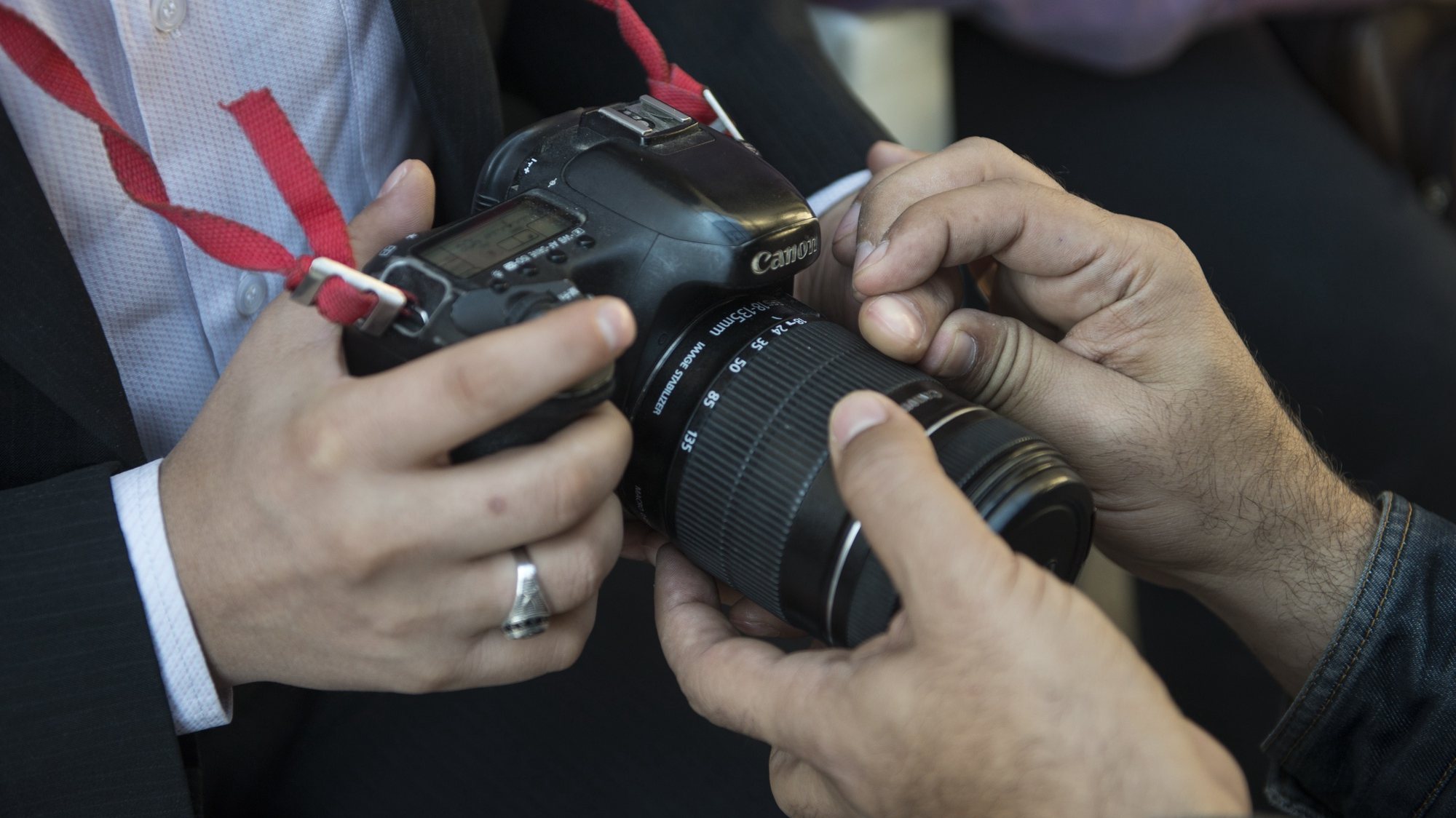 epa08090881 A blind man explores the camera during photography course in Cairo, Egypt, 18 December 2019 (issued 26 December 2019). Egyptian photographer Khaled Fareed began an initiative to assist blind and visually impaired people in learning photography. According to Fareed, the aim of the initiative is to help blind people to take photos independently without using mobile phone apps or other equipment designed for visually impaired people, which could help them fulfill their ambition in becoming professional photographers.  EPA/MOHAMED HOSSAM  ATTENTION: This Image is part of a PHOTO SET