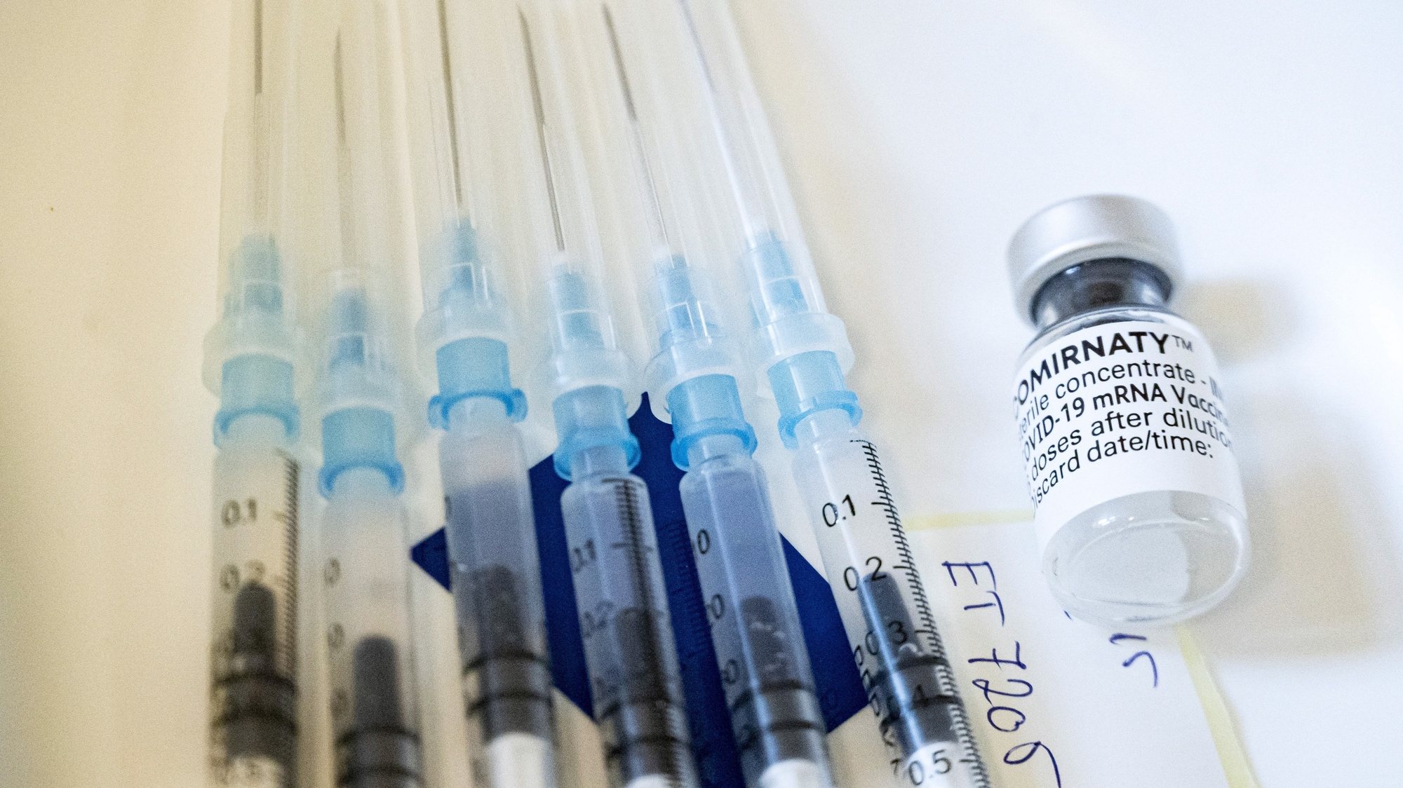 epa09110650 Syringes prepared to inject the Pfizer-BioNtech vaccine against the SARS-CoV-2 coronavirus are seen at Szent Imre Training Hospital in Budapest, Hungary, 01 April 2021, as the vaccination campaign continues in the country.  EPA/Zsolt Szigetvary HUNGARY OUT