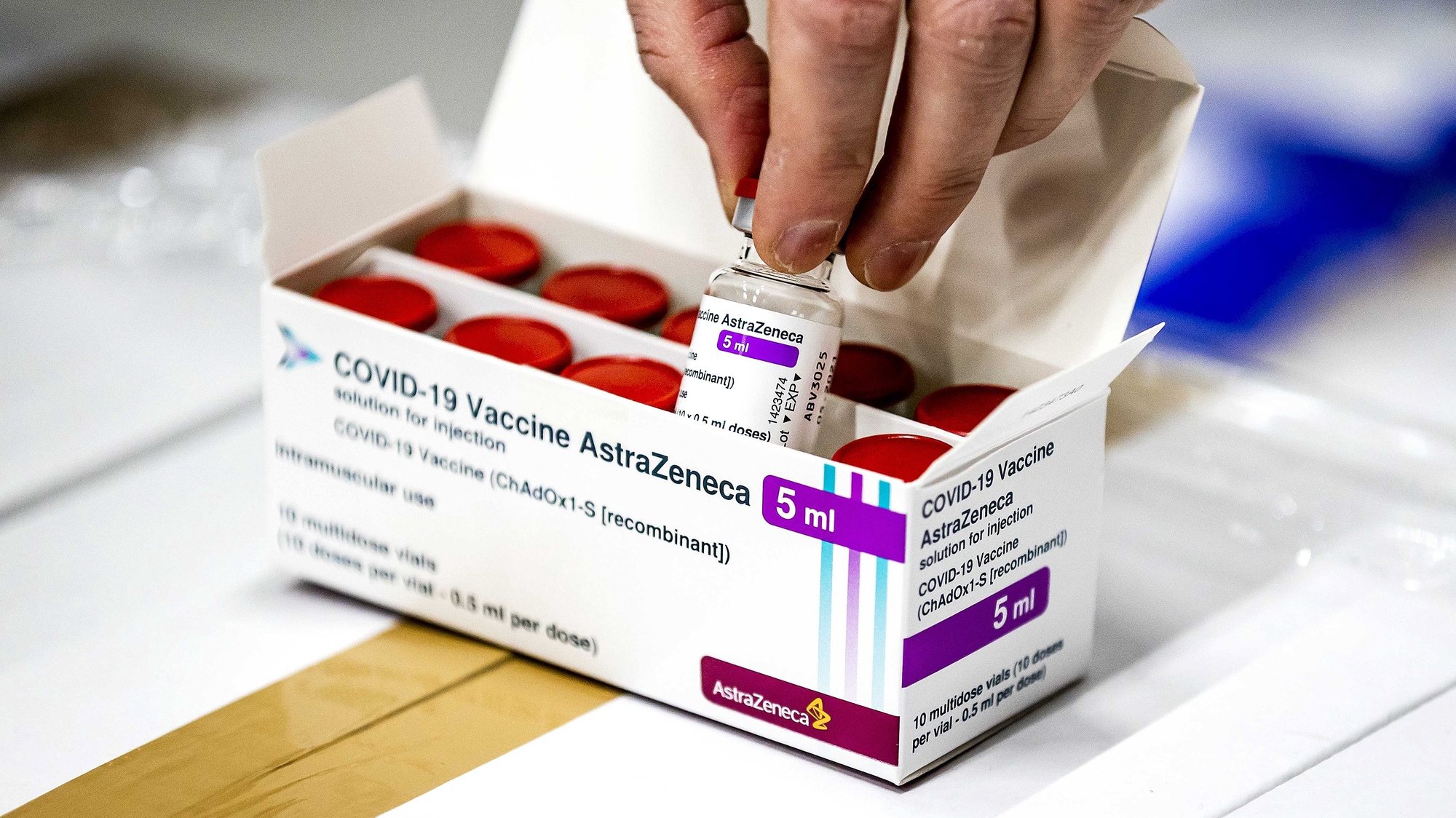 epa09074881 (FILE) - A vial of AstraZeneca&#039;s Covid-19 vaccine stored in Movianto in Oss, The Netherlands, 12 February 2021 (reissued 14 March 2021). The Dutch health ministry on 14 March 2021 said it was suspending the AstraZeneca vaccine rollout, just days after pressing ahead with its use.  EPA/Remko de Waal
