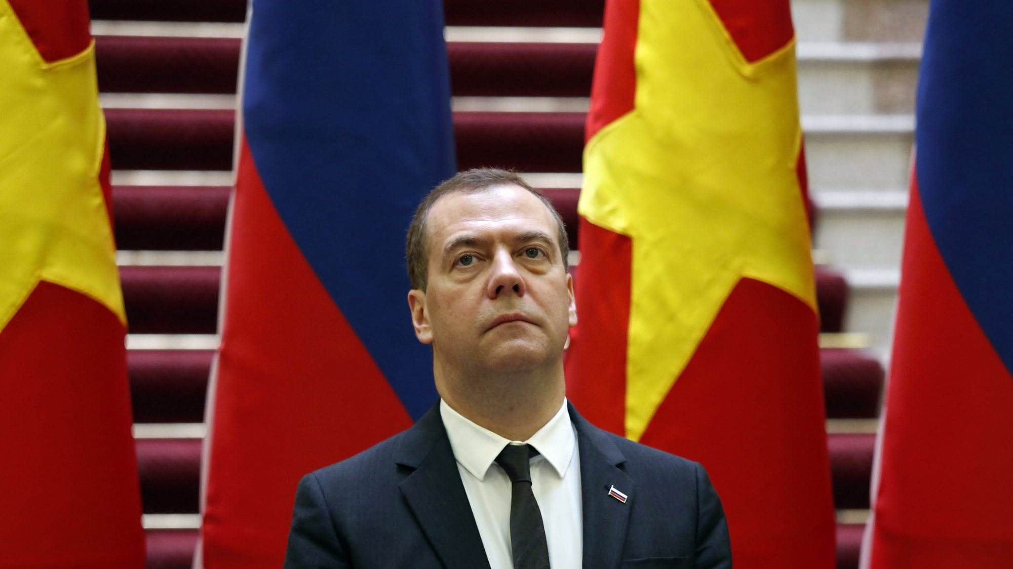 epa07176418 Russia&#039;s Prime Minister Dmitri Medvedev attends a news conference with his Vietnamese counterpart Nguyen Xuan Phuc (not pictured) at the Government Office in Hanoi, Vietnam, 19 November 2018.  EPA/KHAM / POOL