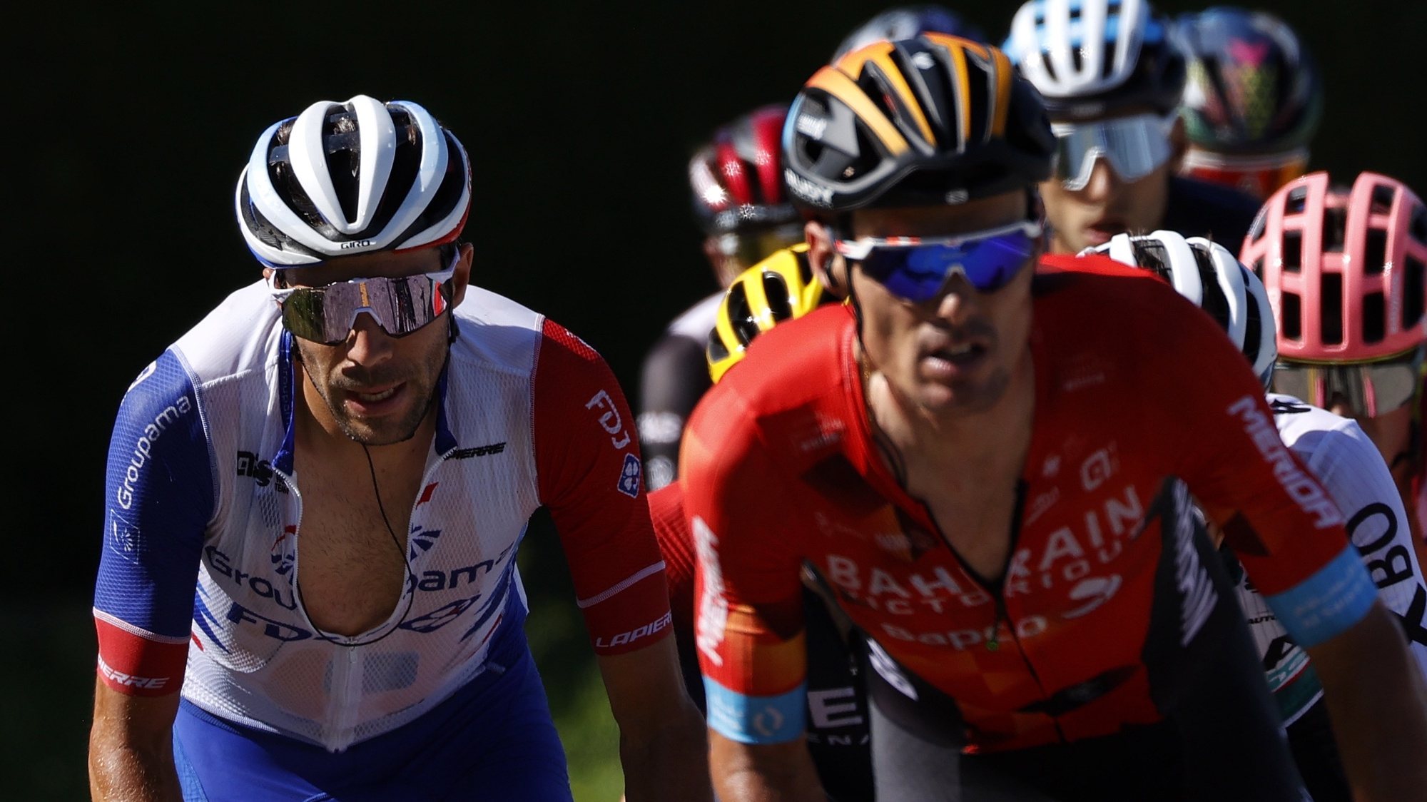 epa10063857 French rider Thibaut Pinot (L) of Groupama Fdj in action during the 9th stage of the Tour de France 2022 over 192.9km from Aigle in Switzerland to Chatel Les Portes du Soleil in France, 10 July 2022.  EPA/YOAN VALAT