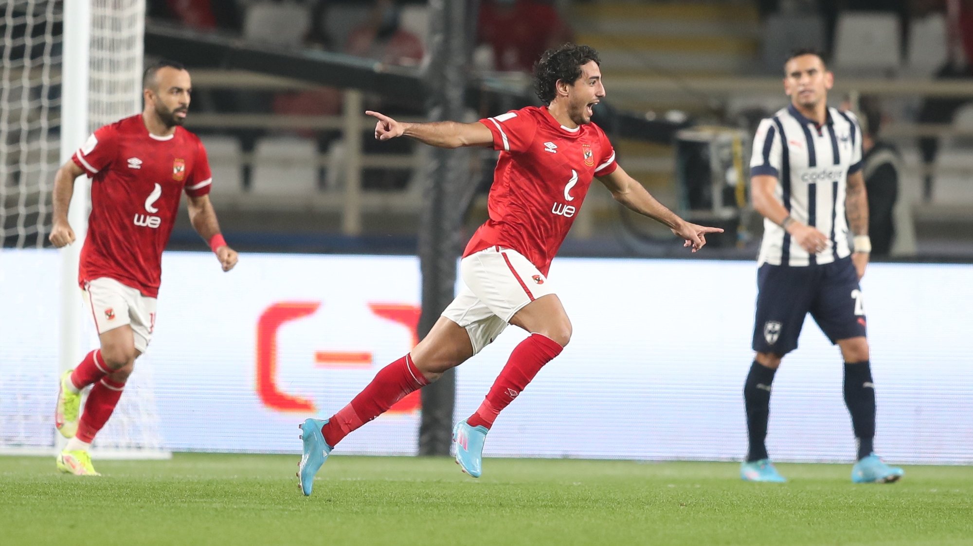 epa09730472 Mohamed Hany (C) of Al Ahly SC celebrates after scoring a goal during the FIFA Club World Cup 2021 second round soccer match between Al Ahly SC and CF Monterrey in Abu Dhabi, United Arab Emirates, 05 February 2022.  EPA/ALI HAIDER