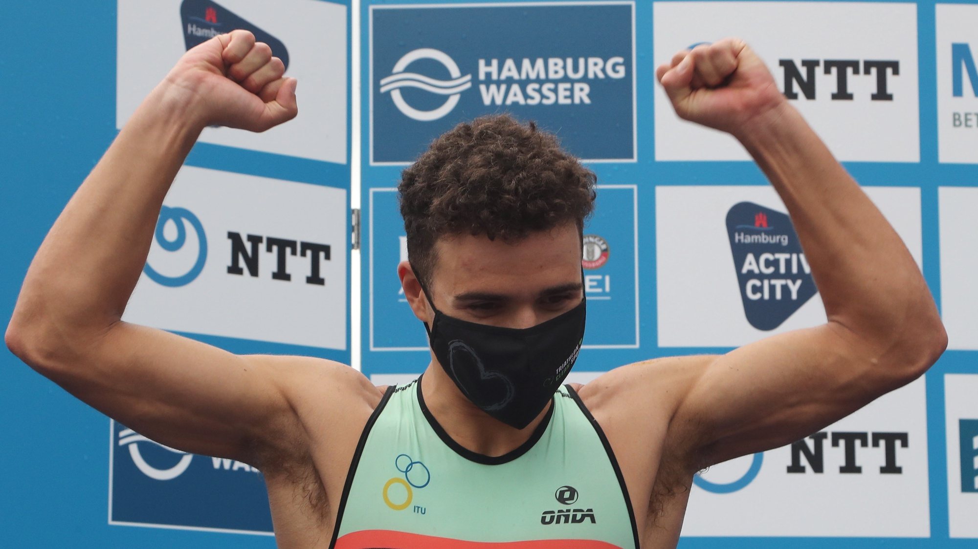 epa08649353 Vasco Vilaca from Portugal celebrates his second place in the Men’s Elite race of the Hamburg Wasser World Triathlon event in Hamburg, northern Germany, 05 September 2020.  EPA/FOCKE STRANGMANN