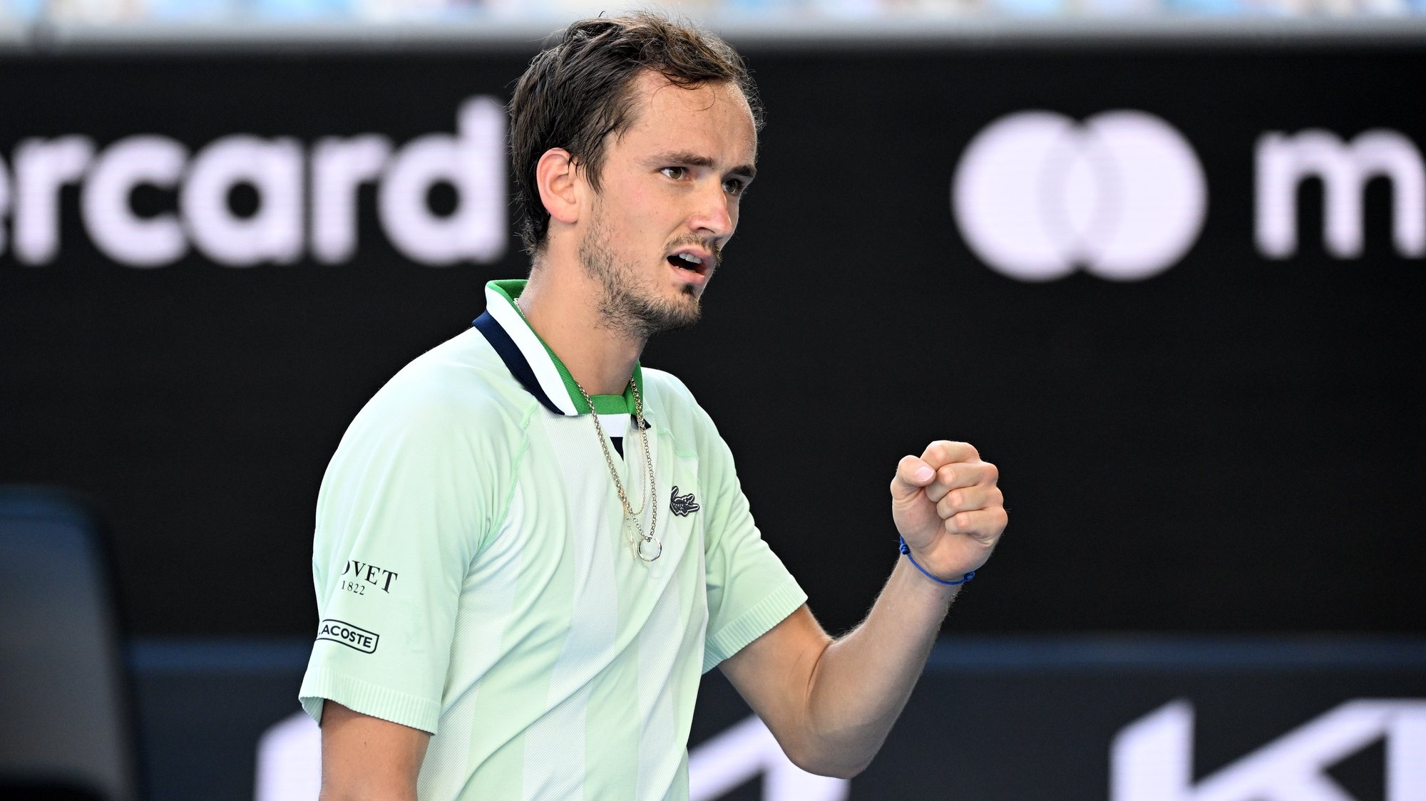 epa09701392 Daniil Medvedev of Russia reacts while in action against Botic van de Zandschulp of the Netherlands during their third round match of the Australian Open Tennis Tournament at Melbourne Park in Melbourne, Australia, 22 January 2022.  EPA/DAVE HUNT  AUSTRALIA AND NEW ZEALAND OUT