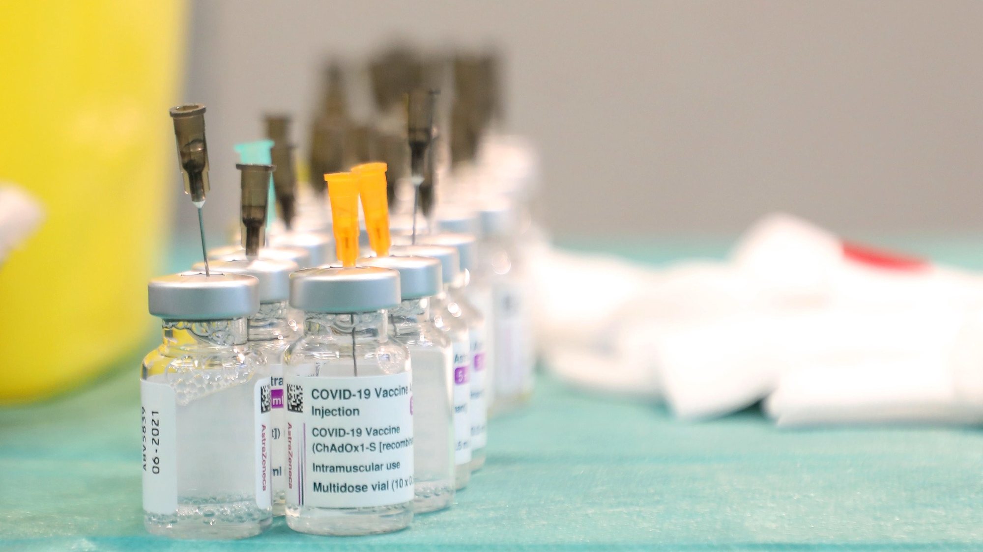 epa09130400 Vials are prepared for injections at the COVID19 vaccination hub that has been set up at villa Erba in Cernobbio, near Como, northern Italy, 12 April 2021. Some 2.2 million doses of COVID-19 vaccines are set to arrive in Italy this week, health sources said on 12 April 2021.  EPA/MATTEO BAZZI