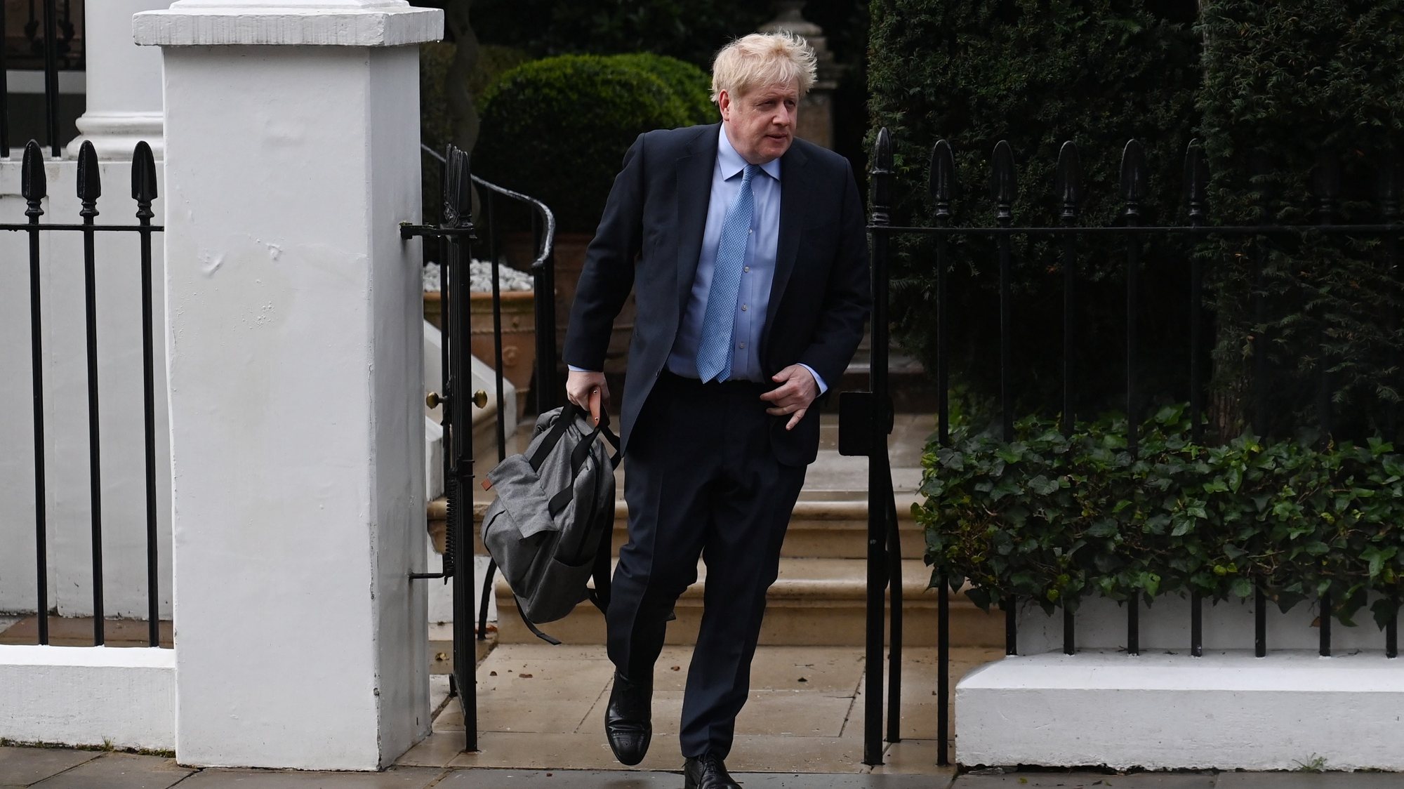 epa10536454 Britain&#039;s former Prime Minster Boris Johnson departs his home in London, Britain, 22 March 2023. Johnson is set to give evidence to MPs who are investigating accusations that he misled parliament over Partygate after breaching covid rules in 2020.  EPA/NEIL HALL