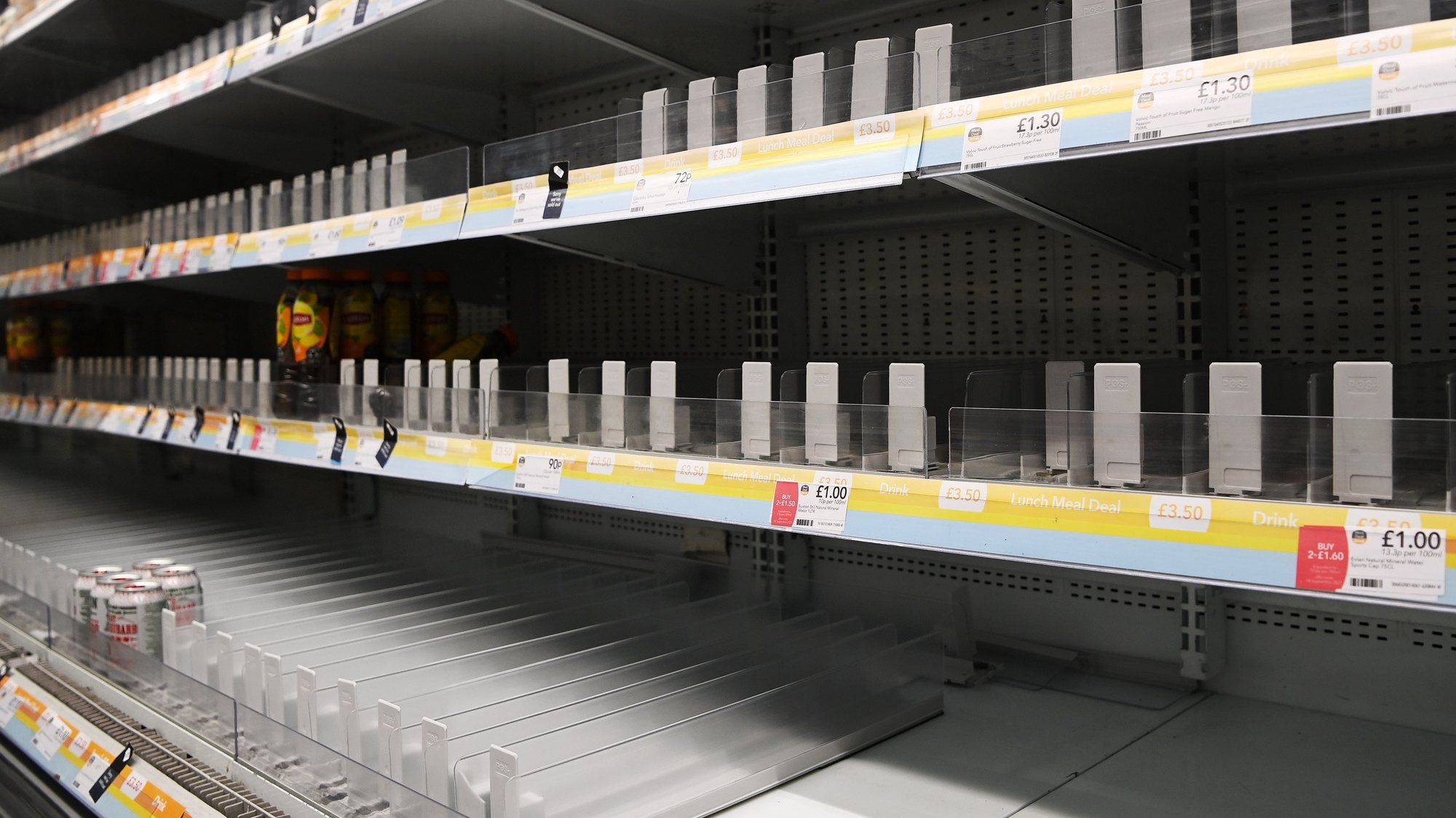 epa09430566 Bare shelves at a supermarket in central London, Britain, 26 August 2021. The shortage of lorry drivers has left supermarkets and restaurants short of produce across the UK. Nando&#039;s and McDonald&#039;s has been hit by supply chains in recent days. Brexit and the Covid pandemic has meant there aren&#039;t enough lorry drivers to meet the demand.  EPA/ANDY RAIN