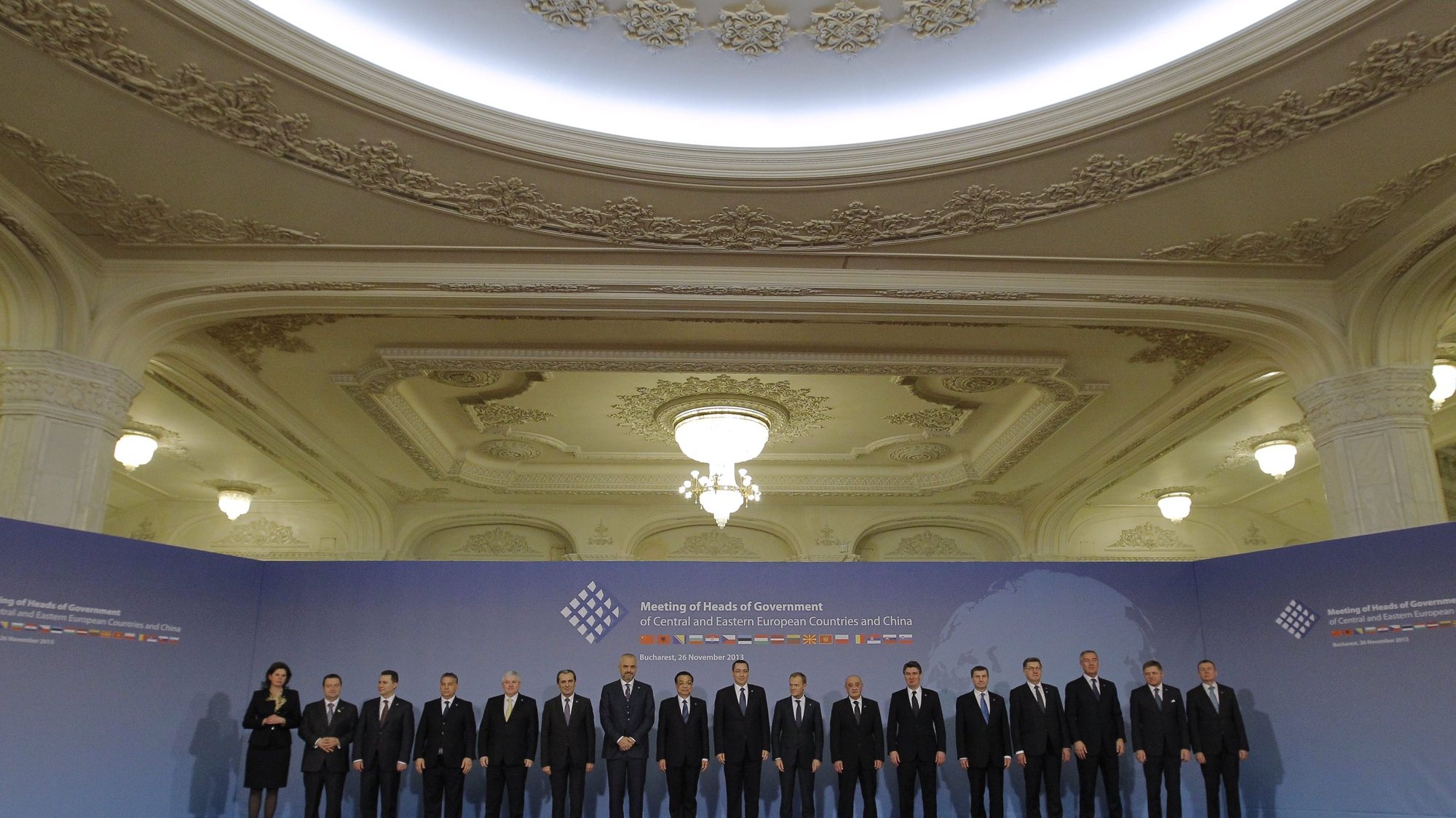 epa03965995 Family photo taken during the China -CEE (Central and East European Countries) Summit, at the Parliament Palace, in Bucharest, Romania, 26 November 2013. The Meeting of the Heads of Government in Central and Eastern Europe - China was attended by prime ministers of Albania, Bosnia-Herzegovina, Bulgaria, Czech Republic, Croatia, Estonia, Lithuania, Macedonia, Montenegro, Poland, Serbia, Slovakia, Slovenia, Hungary and  Latvia, in order to boost trade and investment relations between the two areas, in common projects regarding the sectors of energy, agriculture, infrastructure, transport, IT, and tourism. From left to right, the participants could be identiefied as prime ministers of: Slovenia -Alenka Bratusek, Serbia - Ivica Dacic, Macedonia - Nikola Gruevski, Hungary - Viktor Orban, Czech Republic - Jiri Rusnok, Bulgaria -  Plamen Oresharski, Albania - Edi rama, China - Li-Keqiang, Romania- Victor Ponta, Poland - Donald Tusk, Bosnia Herzegovina - Vjeroslav Bevanda, Croatia - Zoran Milanovic, Estonia - Andrus Ansip, Lithuania - Algirdas Butkevicius, Montenegro - Milo Djukanovic, Slovakia - Robert Fico, and Latvia Foreign Minister Edgars Rinkevics.  EPA/ROBERT GHEMENT