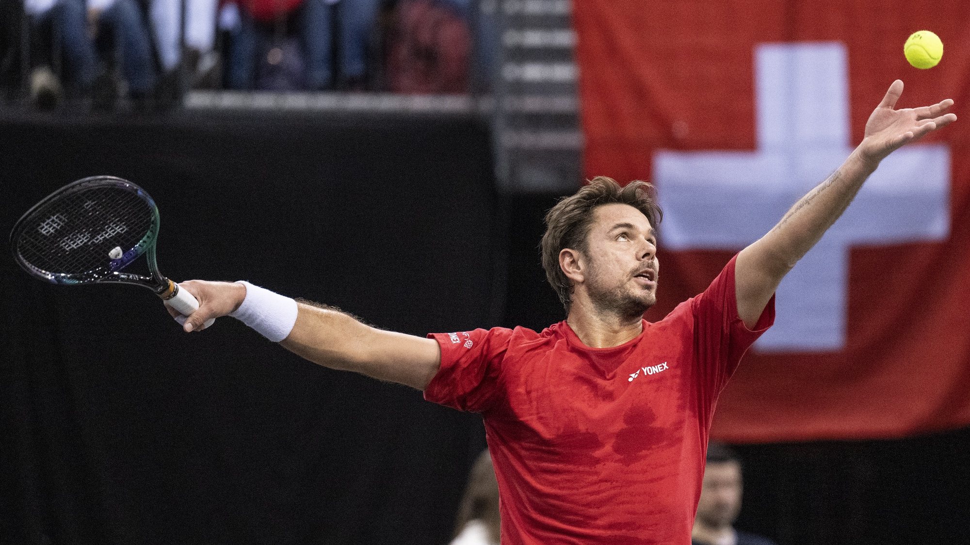 epa10447742 Switzerland&#039;s Stan Wawrinka in action against Germany&#039;s Daniel Altmaier, during the tennis Davis Cup qualifiers match for the 2023 group stage between Germany and Switzerland, at the Arena in Trier, Germany, 04 February 2023.  EPA/PETER SCHNEIDER