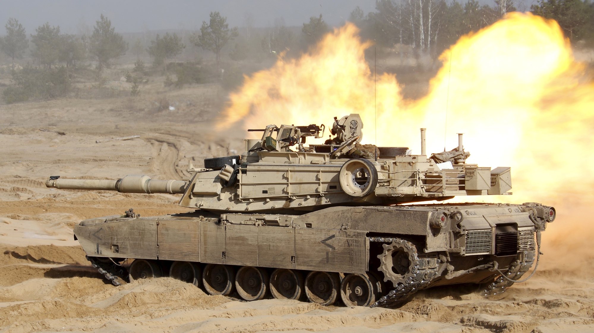 epa10429124 (FILE) - U.S. soldiers of the NATO Extended Presence Battlegroup with their &#039;M1A1 Abrams&#039; battle tank participiate in the military exercise Crystal Arrow 2021 in Adazi Militari base, Latvia, 26 March 2021 (reissued 25 January 2023). The US are to send some 31 of their M1 Abrams tanks to the Ukraine, US President Biden announced on 25 January 2023. The annnouncement comes the same day Germany cleared the way for deliveries of German-made Leopard 2 tanks to the Ukraine. Russian troops entered Ukraine territory on 24 February 2022, starting an armed conflict that has provoked destruction and a humanitarian crisis.  EPA/VALDA KALNINA *** Local Caption *** 56789482
