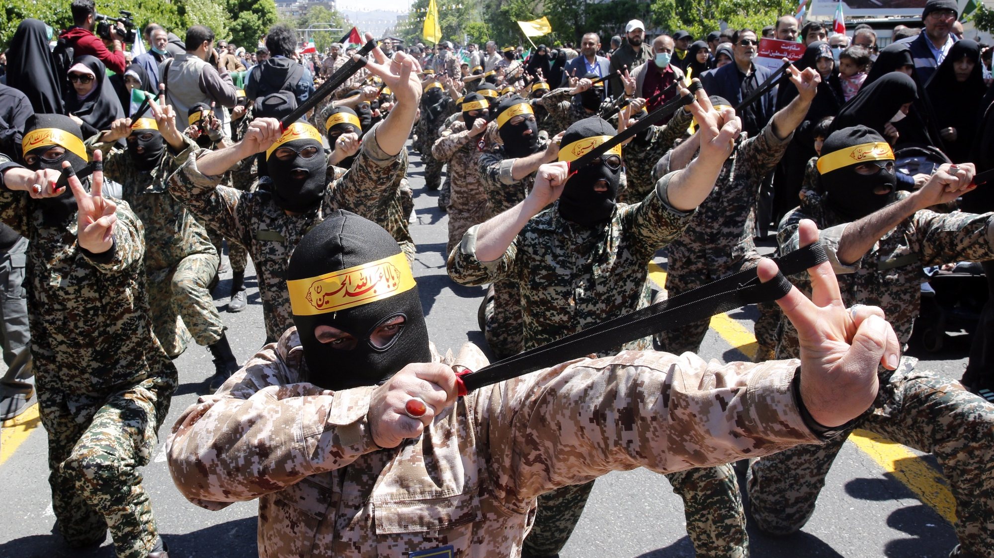 epa10572185 Members of the Basij paramilitary forces take part in a rally marking Al Quds Day in Tehran, Iran, 14 April 2023. Al-Quds Day was declared in 1979 by the late Ayatollah Khomeini, founder of the Islamic Iranian Republic, who called on the world&#039;s Muslims to show solidarity with Palestinians on the last Friday of the fasting month of Ramadan.  EPA/ABEDIN TAHERKENAREH