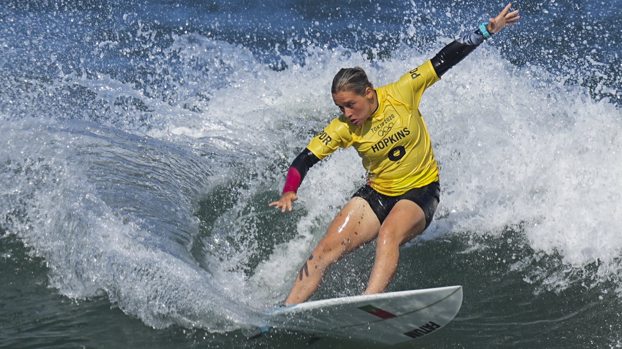 epa09363878 Yolanda Hopkins from Portugal surfs during the Women&#039;s Round 1 of the Surfing events of the Tokyo 2020 Olympic Games at the Tsurigasaki Surfing Beach in Ichinomiya, Japan, 25 July 2021.  EPA/NIC BOTHMA