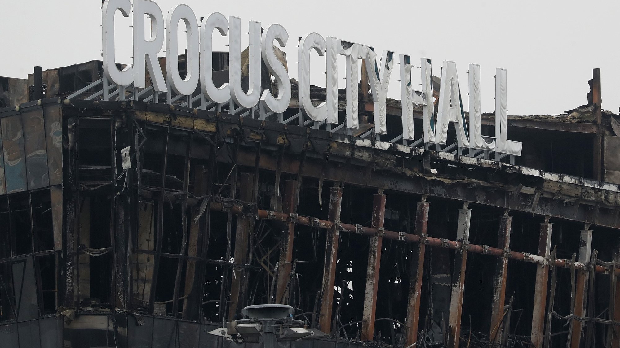 epa11241015 A view of the Crocus City Hall concert venue following a terrorist attack in Krasnogorsk, outside Moscow, Russia, 24 March 2024. Russia observes a day of national mourning for the victims of the terrorist attack in Crocus City Hall in Krasnogorsk. On 22 March, a group of gunmen attacked the Crocus City Hall in the Moscow region, Russian emergency services said. According to the latest data from the Russian Investigative Committee, 152 people died and more than 100 were hospitalized. On the morning of 23 March, the director of the Russian FSB, Alexander Bortnikov, reported to Russian President Vladimir Putin about the detention of 11 people, including all four terrorists directly involved in the terrorist attack.  EPA/MAXIM SHIPENKOV