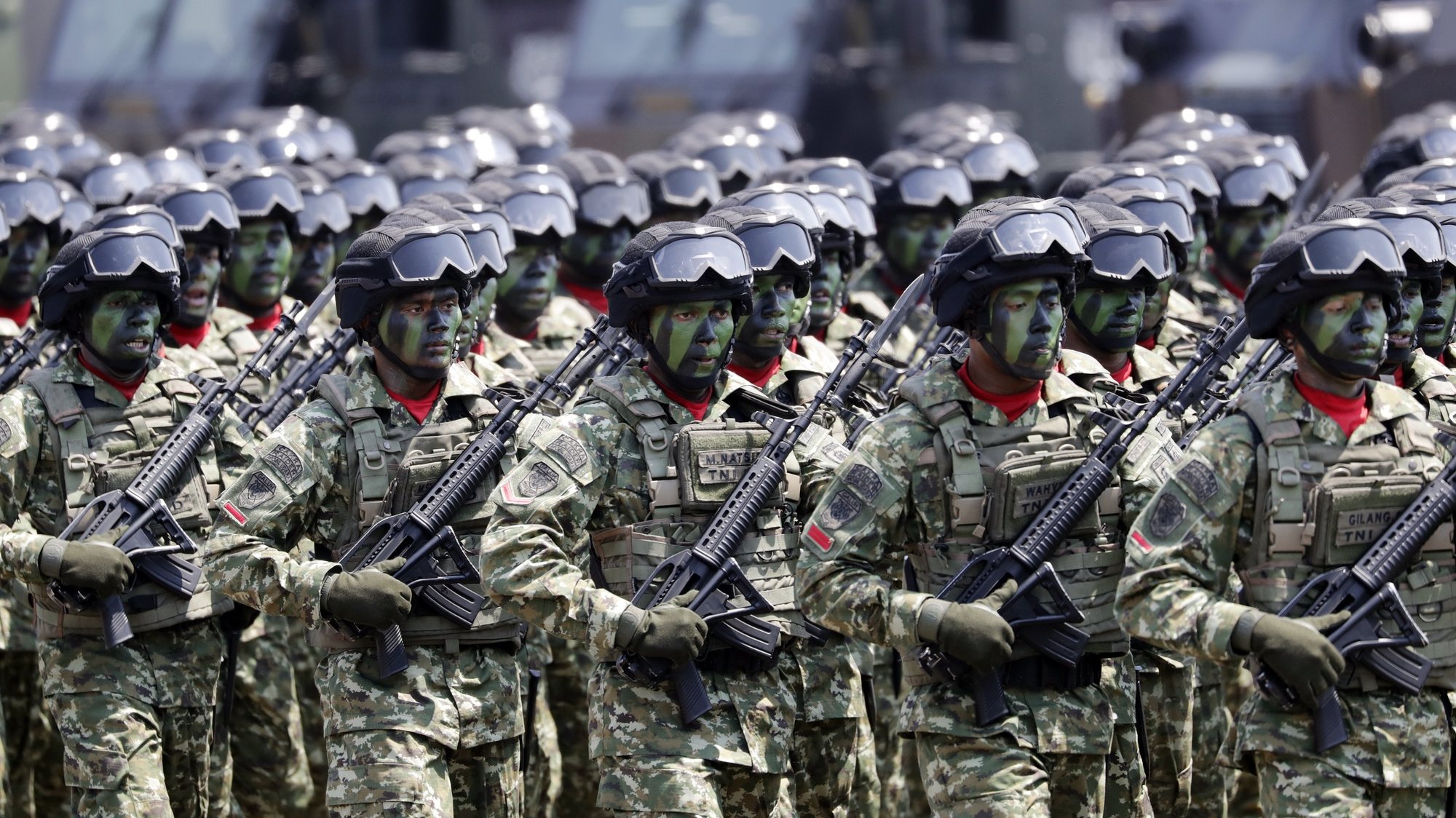 epa07897179 Indonesian Army soldiers march during a ceremony to mark the 74th Indonesian National Armed Forces Day, at Halim Perdanakusuma Air Force Base in Jakarta, Indonesia, 05 October 2019.  EPA/MAST IRHAM