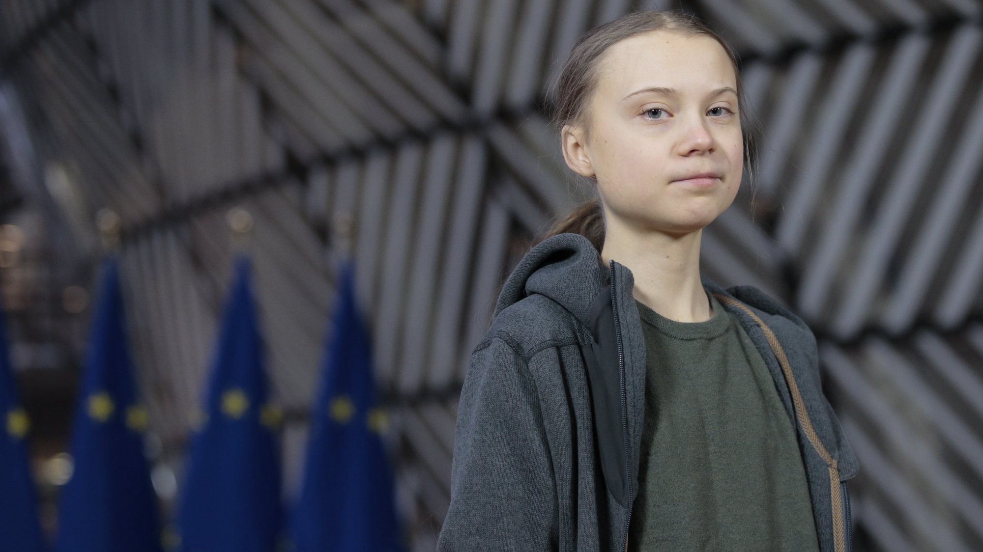 epa08271087 Swedish climate activist Greta Thunberg speaks to the media at the European council building before meeting with EU environment ministers in Brussels, Belgium, 05 March 2020.  EPA/OLIVIER HOSLET