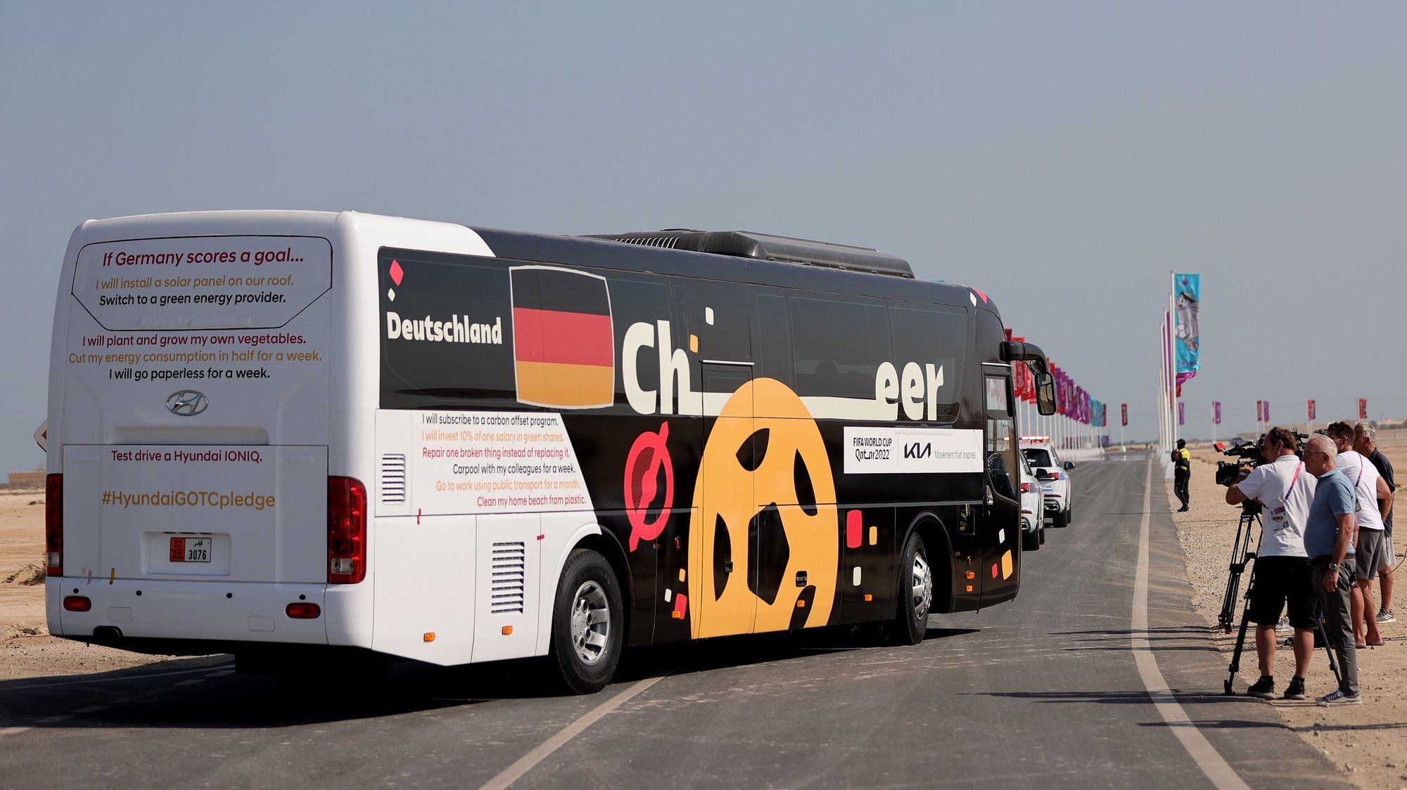 epa10343776 A bus carrying Germany&#039;s national team departs from the World Cup base camp Zulal Wellness Resort near Al-Ruwais, Qatar, 02 December 2022. The German team returns home after failing to qualify for the knockout stage of the FIFA World Cup Qatar 2022.  EPA/FRIEDEMANN VOGEL