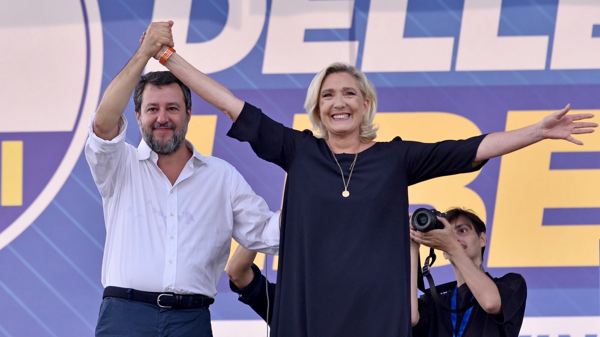 epa10866201 Italy&#039;s Lega party leader Matteo Salvini (L) with president of France&#039;s Rassemblement National Marine Le Pen (R) join hands during the traditional Lega (League) party rally in Pontida (Bergamo), northern Italy, 17 September 2023. Italy&#039;s League party held its annual rally at Pontida, with Marine Le Pen, the president of France&#039;s National Rally (RN) party as the guest of honor. &#039;You in Italy and we in France are engaged in the same fight, the fight for freedoms, for the homeland&#039;, said Marine Le Pen speaking at the League rally in Pontida.  EPA/MICHELE MARAVIGLIA