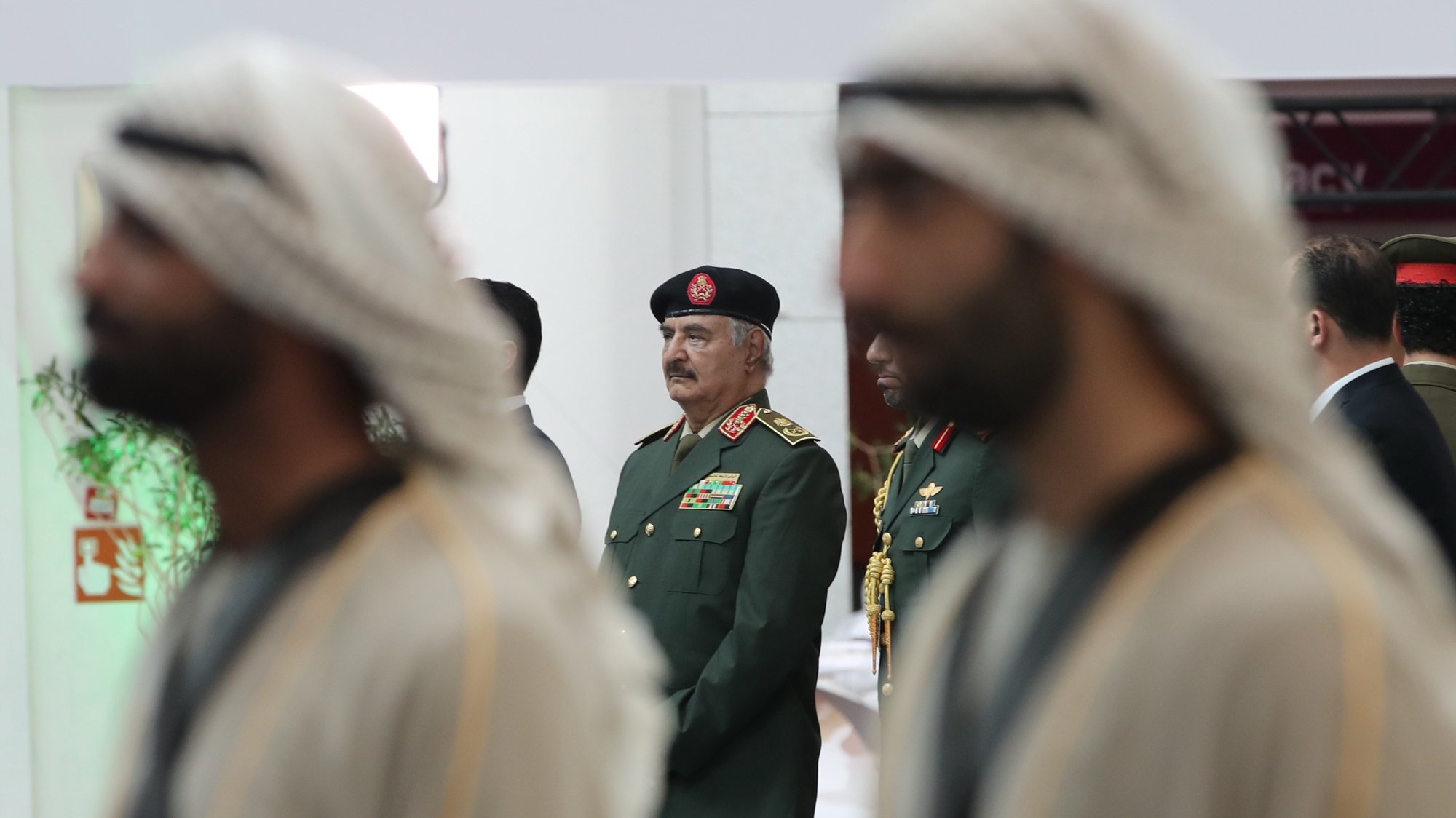 epa10479627 Commander of the Libyan National Army, Field Marshal Khalifa Belqasim Haftar (C), tours the 16th edition of International Defence Exhibition and Conference (IDEX) and the 7th edition of the Naval Defence and Maritime Security Exhibition (Navdex) in Abu Dhabi, United Arab Emirates, 20 February 2023. IDEX is the largest joint defence exhibition in the Middle East and North Africa (MENA) region, it is running from 20 untill 24 February 2023.  EPA/ALI HAIDER