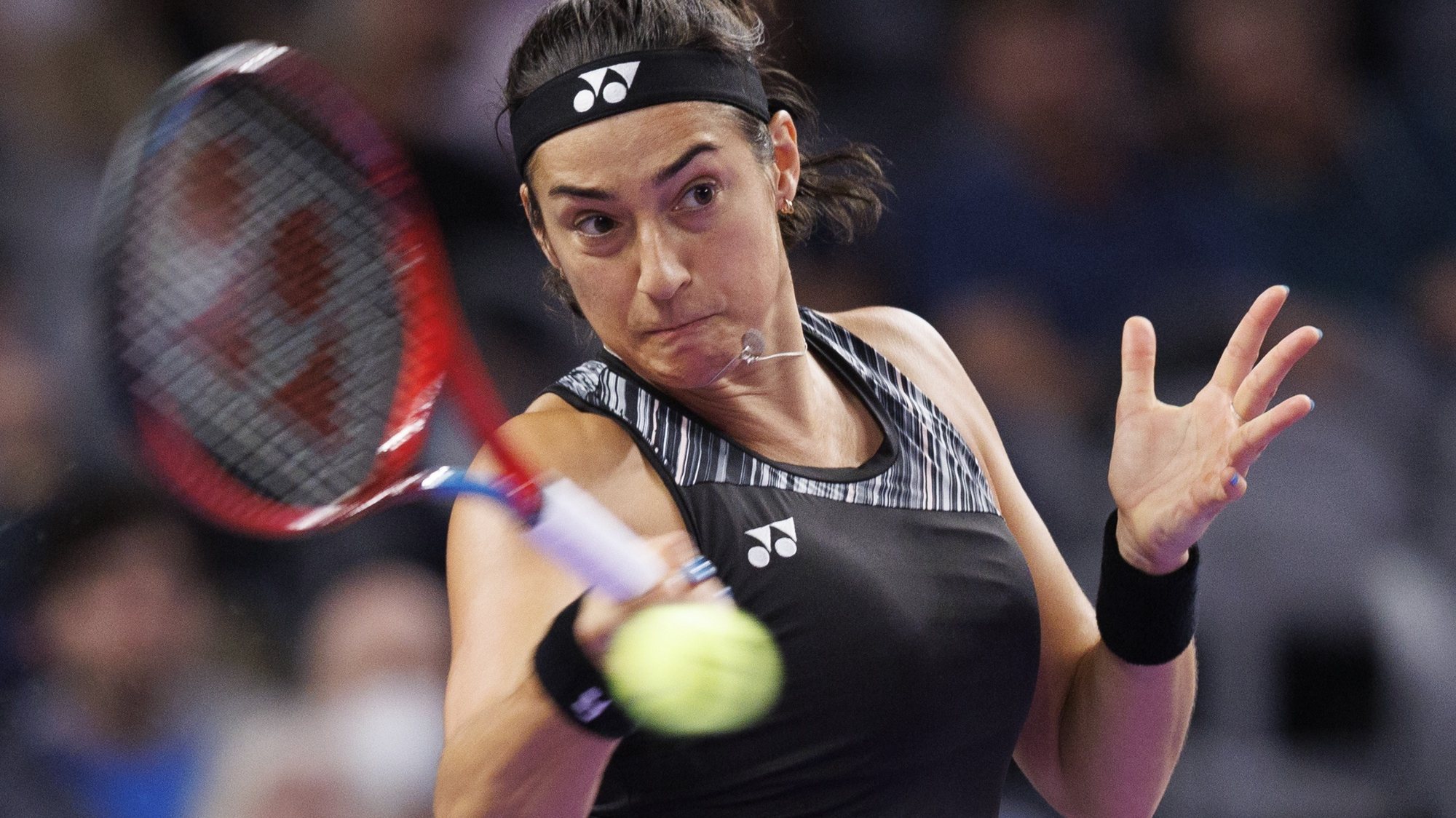 epa10293165 Caroline Garcia of France hits a return to Aryna Sabalenka of Belarus during their finals match of the WTA Finals held at Dickies Arena in Fort Worth, Texas, USA, 07 November 2022.  EPA/CJ GUNTHER