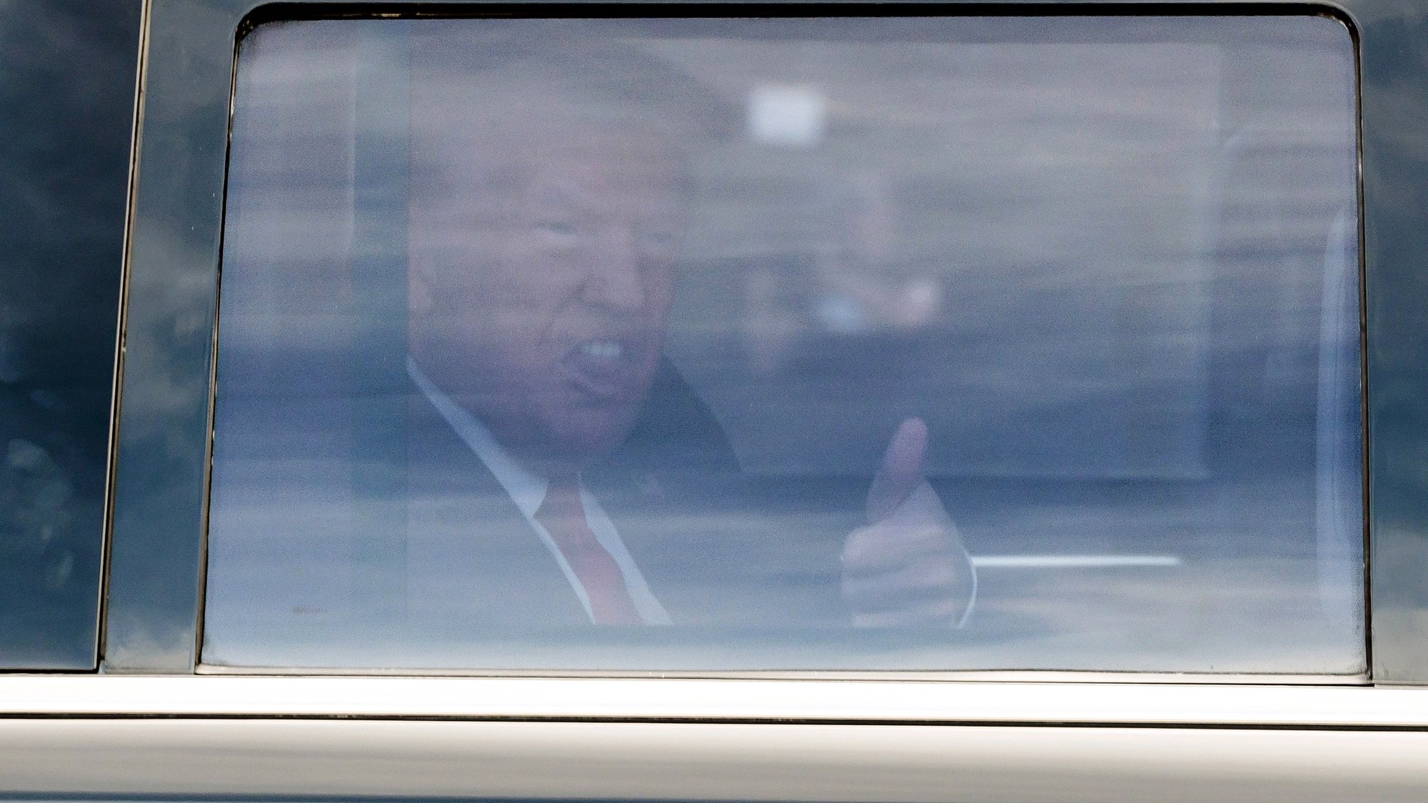 epa10687491 US former President Donald Trump gives a thumbs up from his car as he arrives to Trump National Doral Miami golf course the day before his scheduled federal court appearance in Doral, Florida, USA, 12 June 2023. Trump is facing multiple federal charges stemming from an US Justice Department investigation led by Special Counsel Jack Smith related to the former president’s alleged mishandling of classified national security documents and is scheduled to turn himself into authorities on Tuesday in Miami.  EPA/JUSTIN LANE