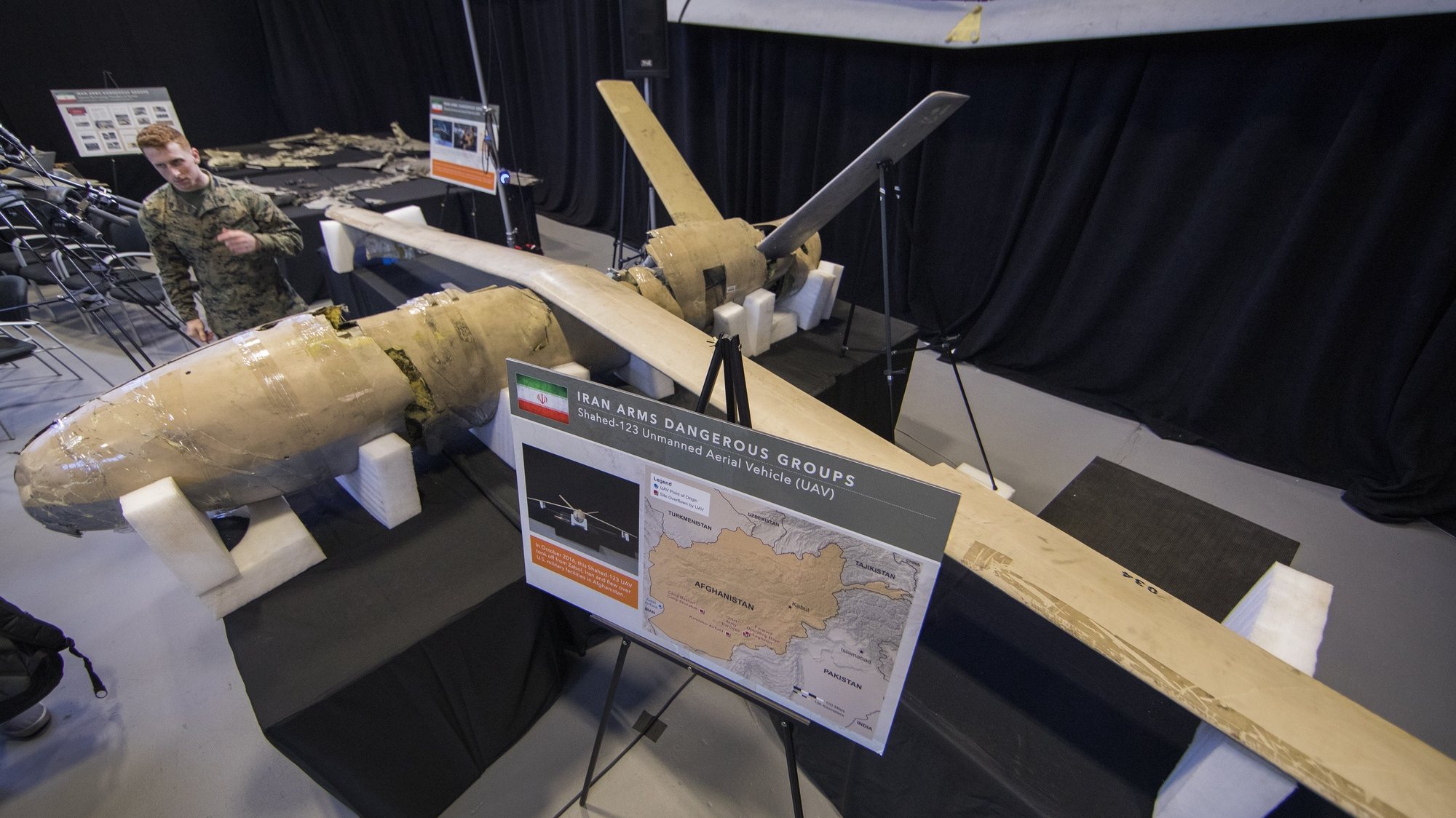 epa07197765 What is said to be a recovered Iranian Shahed-123 unmanned aerial vehicle (UAV), at an &#039;Iranian Materiel Display&#039; press conference in a hangar at Joint Base Anacostia-Bolling in Washington, DC, USA, 29 November 2018. The administration of US President Donald J. Trump is accusing Iran of arming groups with advanced weapons and sowing instability in the Middle East region.  EPA/ERIK S. LESSER