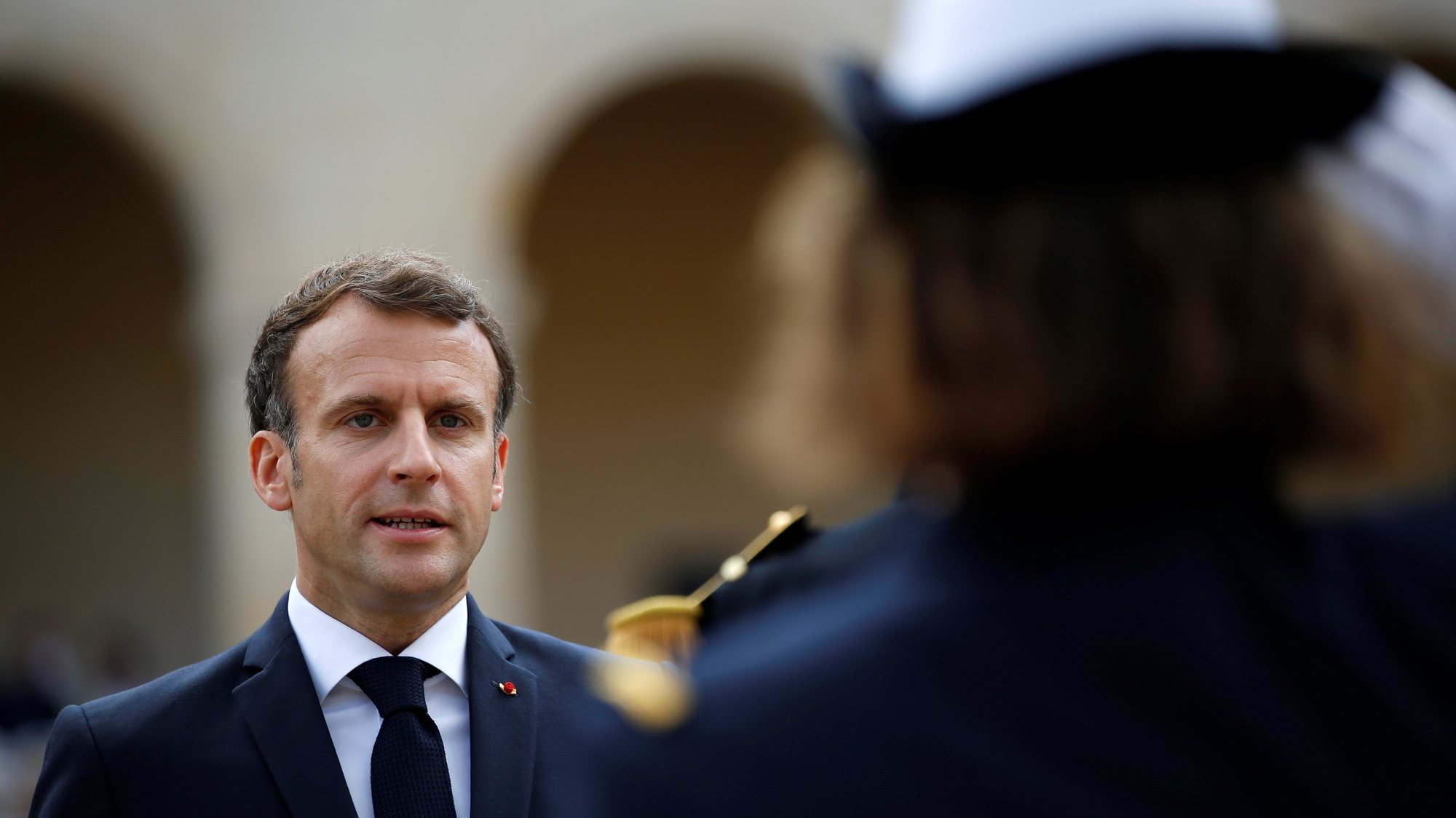epa09330915 French President Emmanuel Macron attends a &#039;prise d&#039;armes&#039; military ceremony at the Invalides in Paris, France, 08 July 2021.  EPA/SARAH MEYSSONNIER / POOL MAXPPP OUT