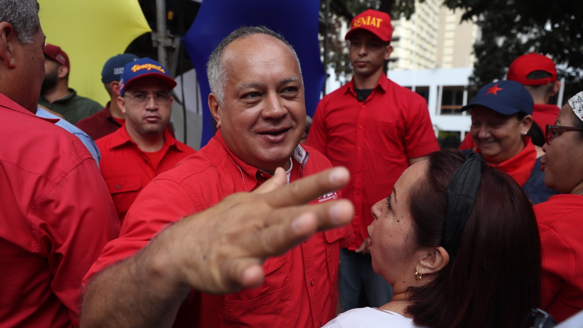 epa08284184 President of the National Constituent Assembly (ANC) Diosdado Cabello joins the people involved in a peace mobilization called by the ruling party, in Caracas, Venezuela, 10 March 2020. In parallel, the Bolivarian National Police (GNP) clashed with opposition protesters when they dispersed with tear gas the demonstration led by opposition leader Juan GuaidÃ³ that intended to reach the Federal Legislative Palace, headquarters of the National Assembly (AN, Parliament) of Venezuela.  EPA/Miguel Gutierrez