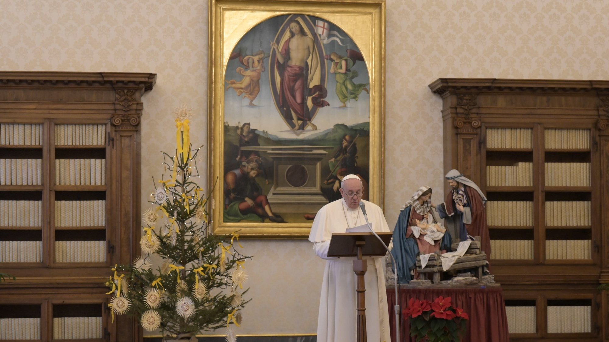 epa08914157 A handout picture provided by the Vatican Media shows Pope Francis delivering a live-streamed weekly Angelus prayer from the Library of the Apostolic Palace at the Vatican, 01 January 2021.  EPA/VATICAN MEDIA HANDOUT  HANDOUT EDITORIAL USE ONLY/NO SALES