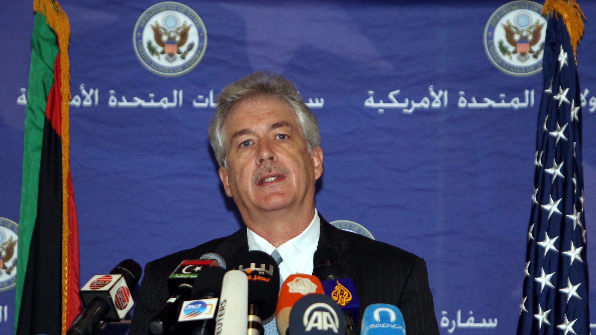 epa04178234 US Deputy Secretary of State William Burns speaks during a press conference in Tripoli, Libya, 24 April 2014. Burns arrived in Libya on 23 April to meet with senior officials. The State Department said the trip reaffirms the US support for the Libyan people as they work to achieve the aspirations of the revolution.  EPA/SABRI ELMHEDWI
