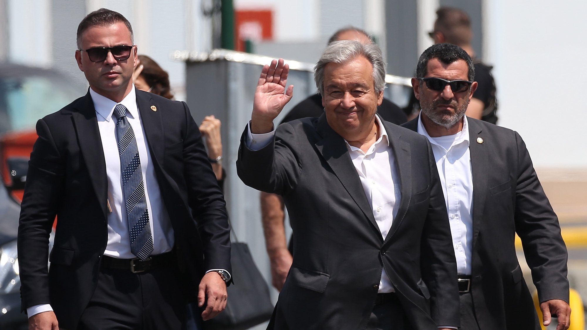 epa10130260 UN Secretary-General Antonio Guterres (C) arrives at the Zeyport to inspect a grain shipment before his Joint Coordination Center (JCC) in Istanbul, Turkey, 20 August 2022. A safe passage deal was signed between Ukraine and Russia to export Ukrainian grain on 22 July in Istanbul.  EPA/ERDEM SAHIN