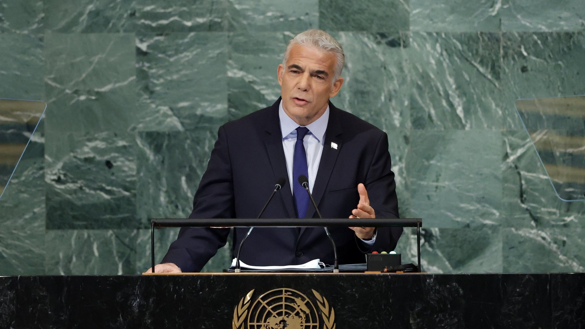 epa10199524 Yair Lapid, Prime Minister and Minister for Foreign Affairs of the State of Israel, delivers his address during the 77th General Debate inside the General Assembly Hall at United Nations Headquarters in New York, New York, USA, 22 September 2022.  EPA/JASON SZENES
