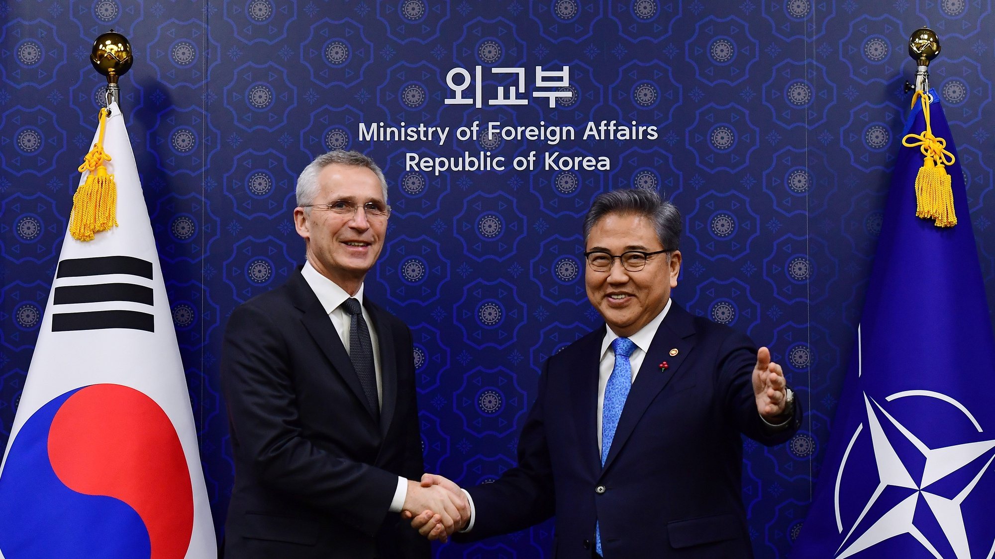 epa10437569 NATO Secretary General Jens Stoltenberg (L) shakes hands with the Minister of Foreign Affairs of South Korea Park Jin (R) during their meeting at the Foreign Ministry in Seoul, South Korea, 29 January 2023.  EPA/Kim Min-Hee / POOL