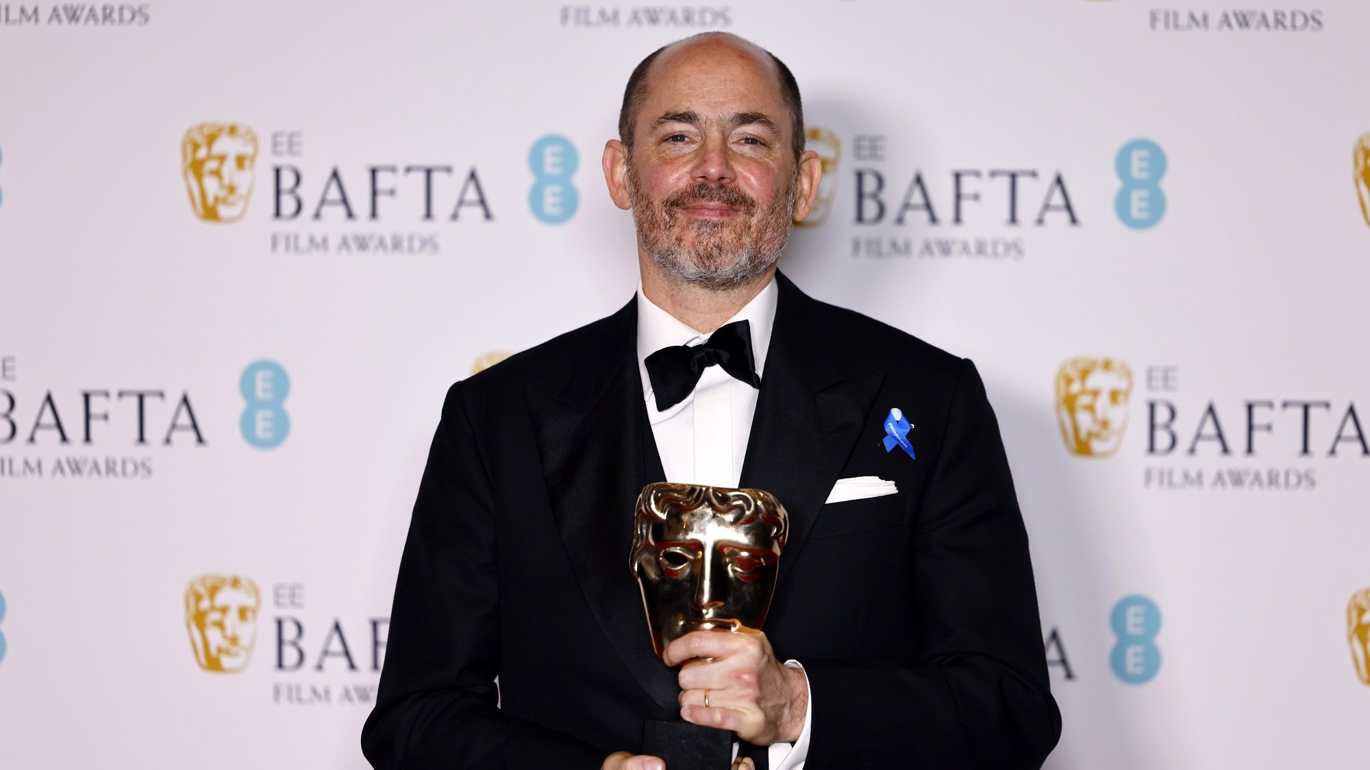 epa10478787 Edward Berger, winner of the &#039;Best Director Award&#039;, poses in the press room of the 2023 EE BAFTA Film Awards ceremony at the Southbank Centre, in London, Britain, 19 February 2023. The event is hosted by the British Academy of Film and Television Arts (BAFTA).  EPA/TOLGA AKMEN *** Local Caption *** TEST CAPTION