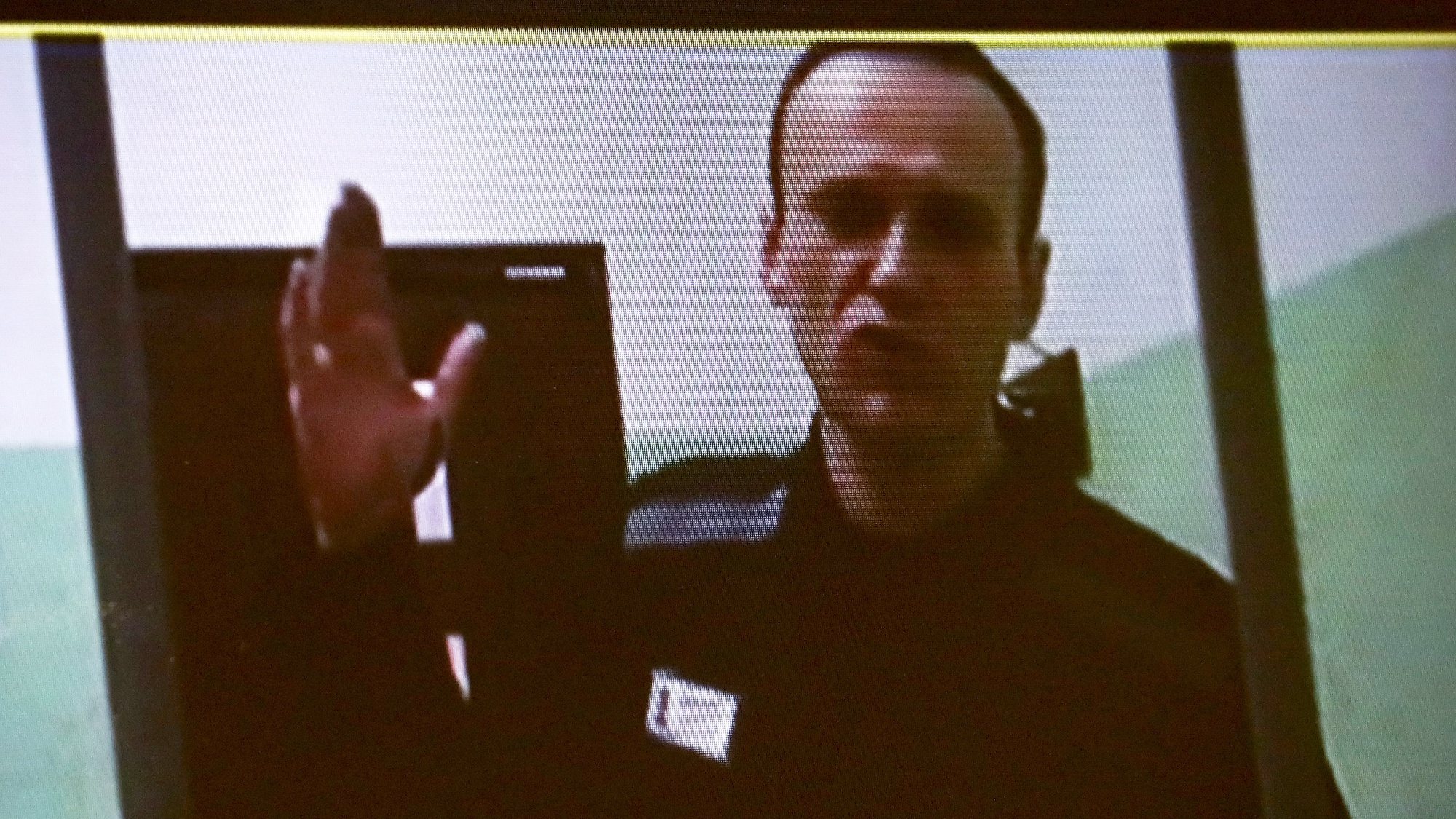 epa10884390 Russian opposition figure Alexei Navalny is seen on a screen as he appears in a video link from the colony in Vladimir region, during a hearing of The First Court of Appeal of General Jurisdiction considering his appeal against the sentence of 19 years in prison in a case of extremism, Moscow, Russia, 26 September 2023. Navalny has been in the colony since February 2021, when the court, at the request of the Federal Penitentiary Service, replaced his suspended sentence in the Yves Rocher case of 2014 with a real one. He was supposed to serve in a penal colony for 2 years and 8 months, but in March 2022, the Lefortovo Court of Moscow, at an off-site meeting in correctional colony in the city of Pokrov, Vladimir Region, sentenced the politician to 9 years of strict regime and a fine of 1.2 million rub., as well as one and a half years of restriction of freedom in the case of fraud and contempt of court. In June 2023 Navalny went on trial on new charges of extremism. The court sentenced politician Alexei Navalny to 19 years in a strict regime colony. The First Court of Appeal of General Jurisdiction rejected the politician&#039;s complaint.  EPA/MAXIM SHIPENKOV