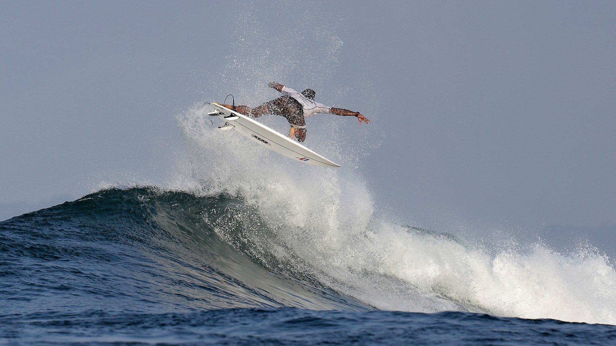 epa10599228 Costa Rican surfer Malakai Martinez in action during the Pan American Surfing Championship, which takes place on Santa Catalina beach, in the province of Veraguas, Panama, 29 April 2023.  EPA/Carlos Lemos
