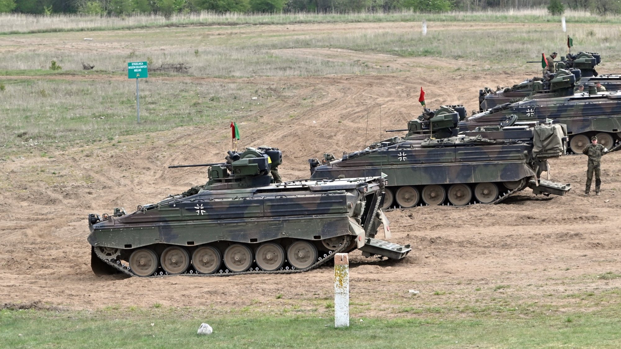 epa09930098 German Marder infantry fighting vehicles in action during in the Defender Europe 2022 military exercise at the Drawsko Pomorskie military range in Drawsko Pomorskie, Poland, 06 May 2022. Poland is among nine countries hosting the Defender Europe 2022 (DE22) and Swift Response 2022 (SR22), large-scale US Army-led, multinational, joint military exercises held from 01 May to 27 May. A total of 18,000 troops from over 20 countries will take part in the drills, including about 7,000 on the territory of Poland.  EPA/Marcin Bielecki POLAND OUT