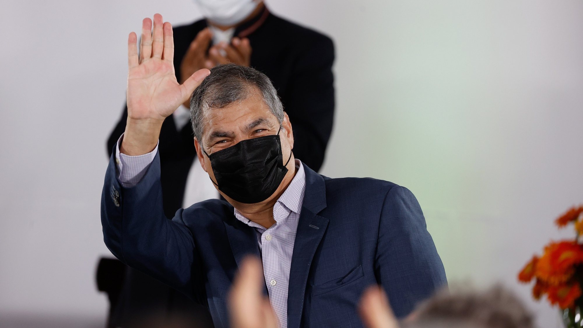 epa09565166 Former president of Ecuador, Rafael Correa, waves while attending the introdution of the book by former president of Boliia, Evo Morales, called &#039;Evo: Operation Rescue. A geopolitical plot in 365 days&#039;, at the Mexican embassy, in Buenos Aires, Argentina, 04 November 2021.  EPA/Juan Ignacio RONCORONI