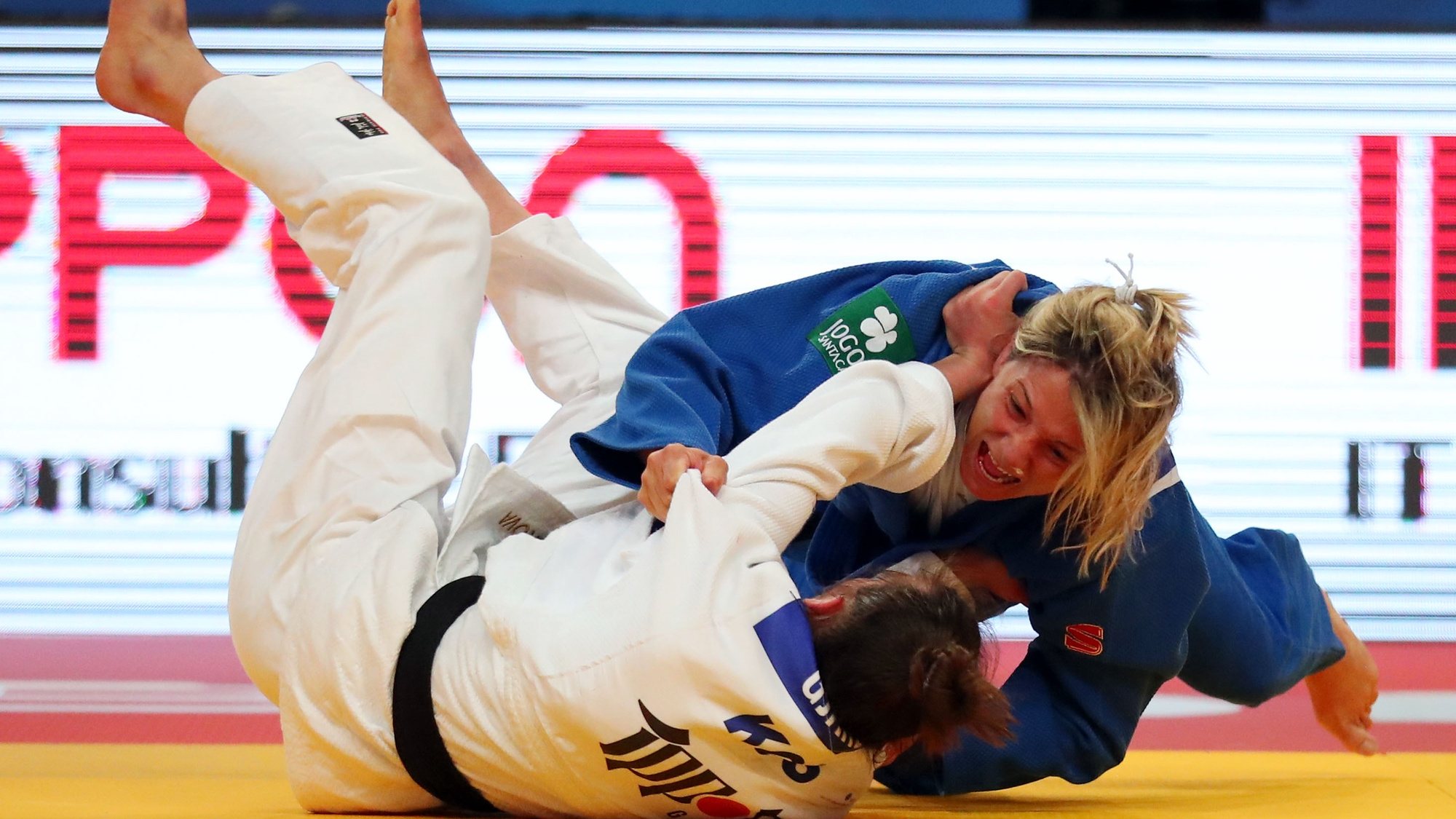 Telma Monteiro of Portugal ( blue) wins with an ippon against Nora Gjakova of Kosovo (white) during the semi-finals match in the woman&#039;s -57kg category at the European Judo Championships in Lisbon, Portugal, 16 April 2021. NUNO VEIGA/LUSA